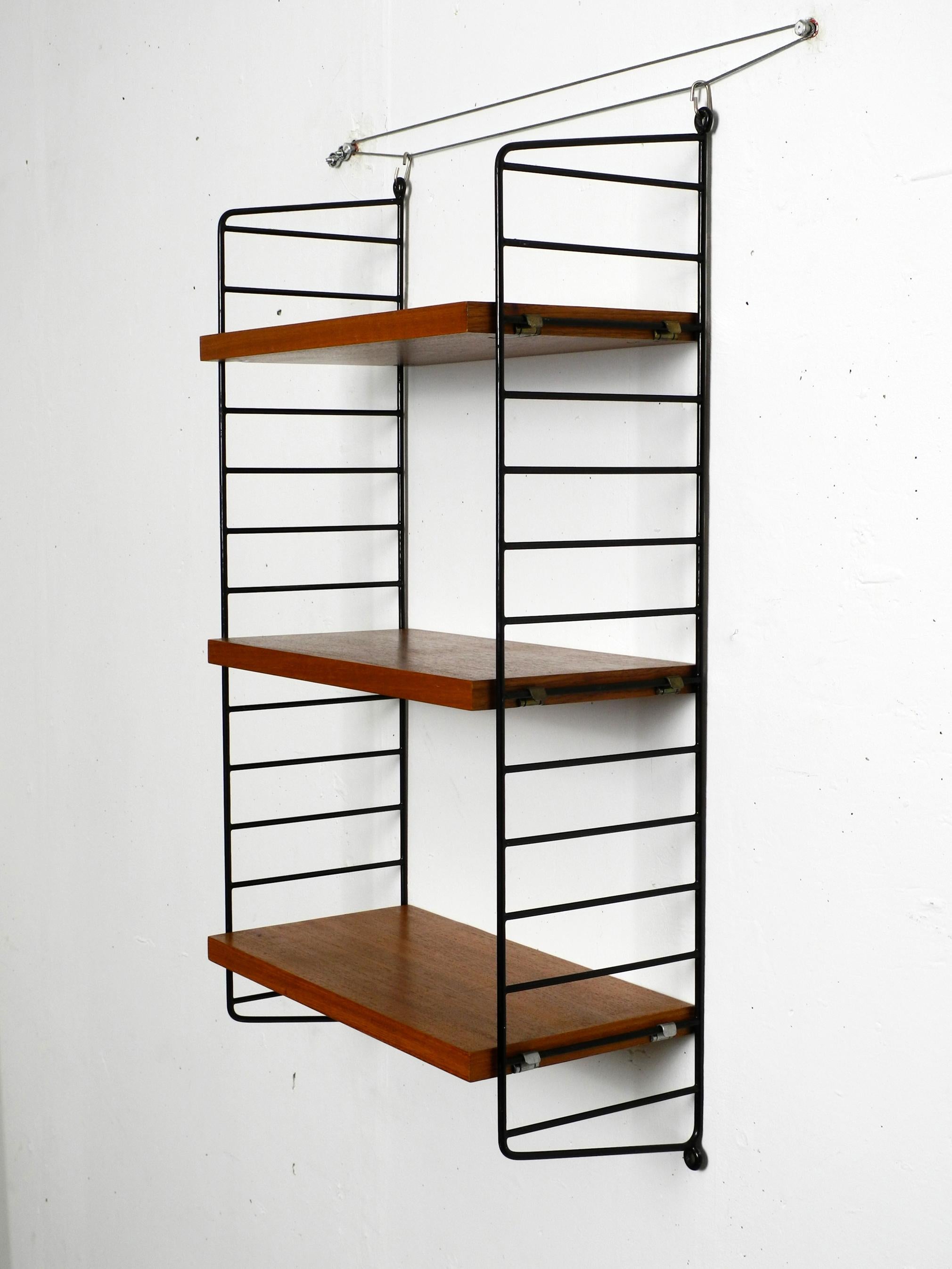 Original 1960s teak wood Nisse Strinning wall hanging shelf with 3 shelves In Good Condition In München, DE