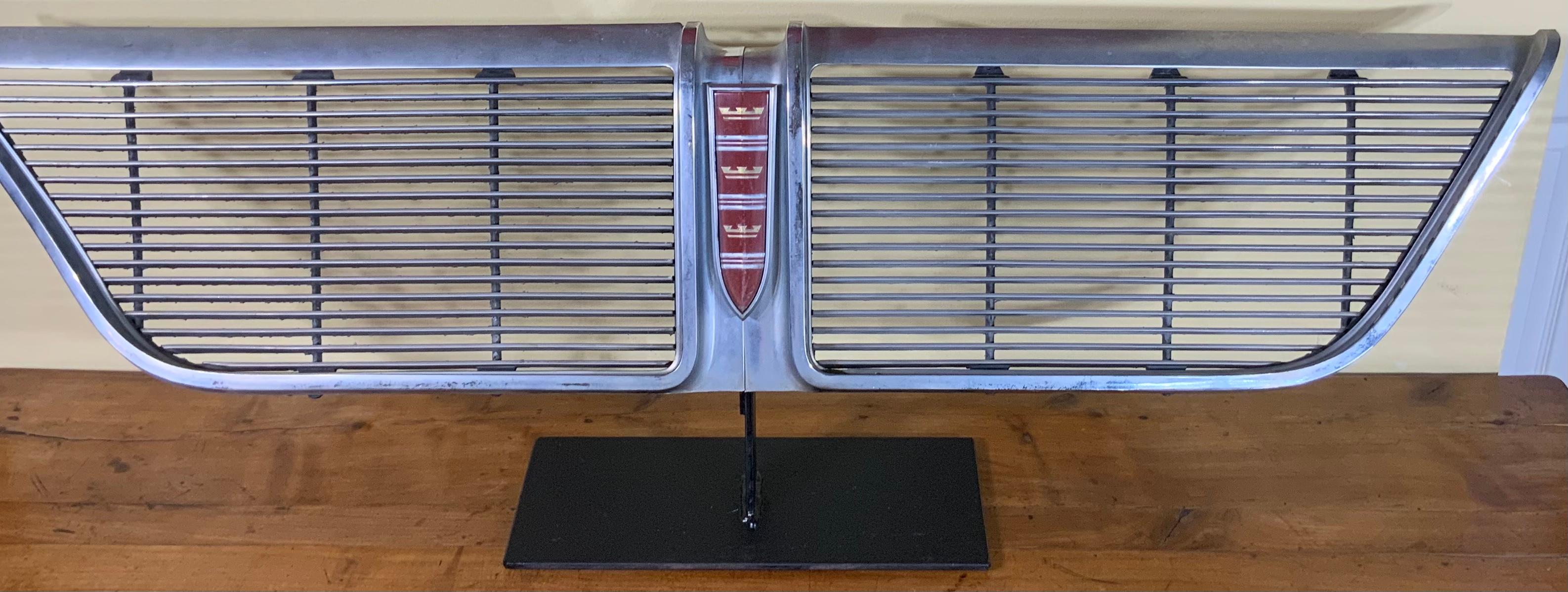 1964 Chrysler New Yorker Chrome Grill professionally mounted on custom-made steel base to make exceptional American industrial object of art for display.
  