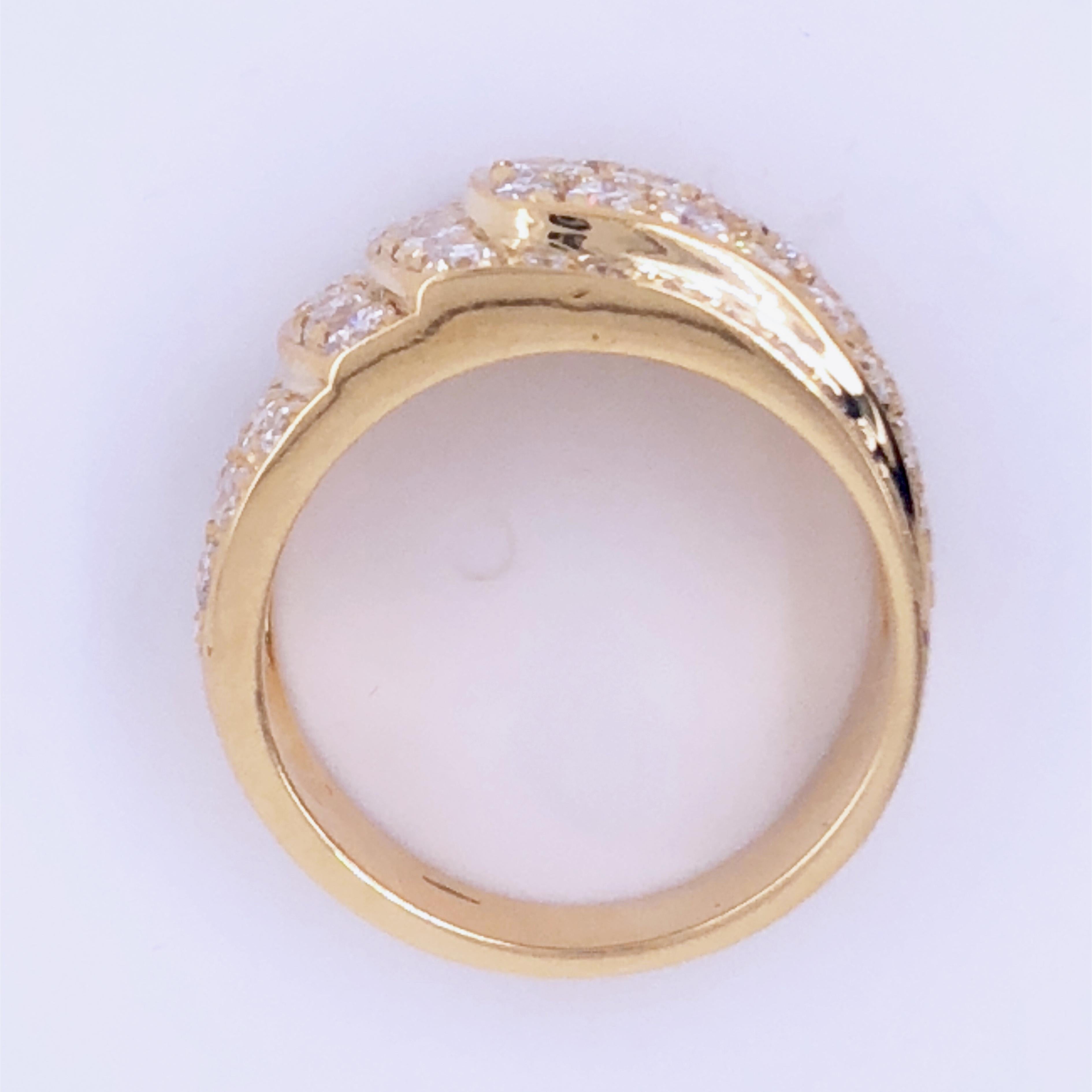 Stunning 2.41 Carat, 71 Top Quality White Diamond French 1970's Yellow Gold Setting Band Ring: this piece while unsigned has a strong design that stands up to some of the biggest jewelry names, Van Cleef & Arpel immediately comes to mind.
Beautiful