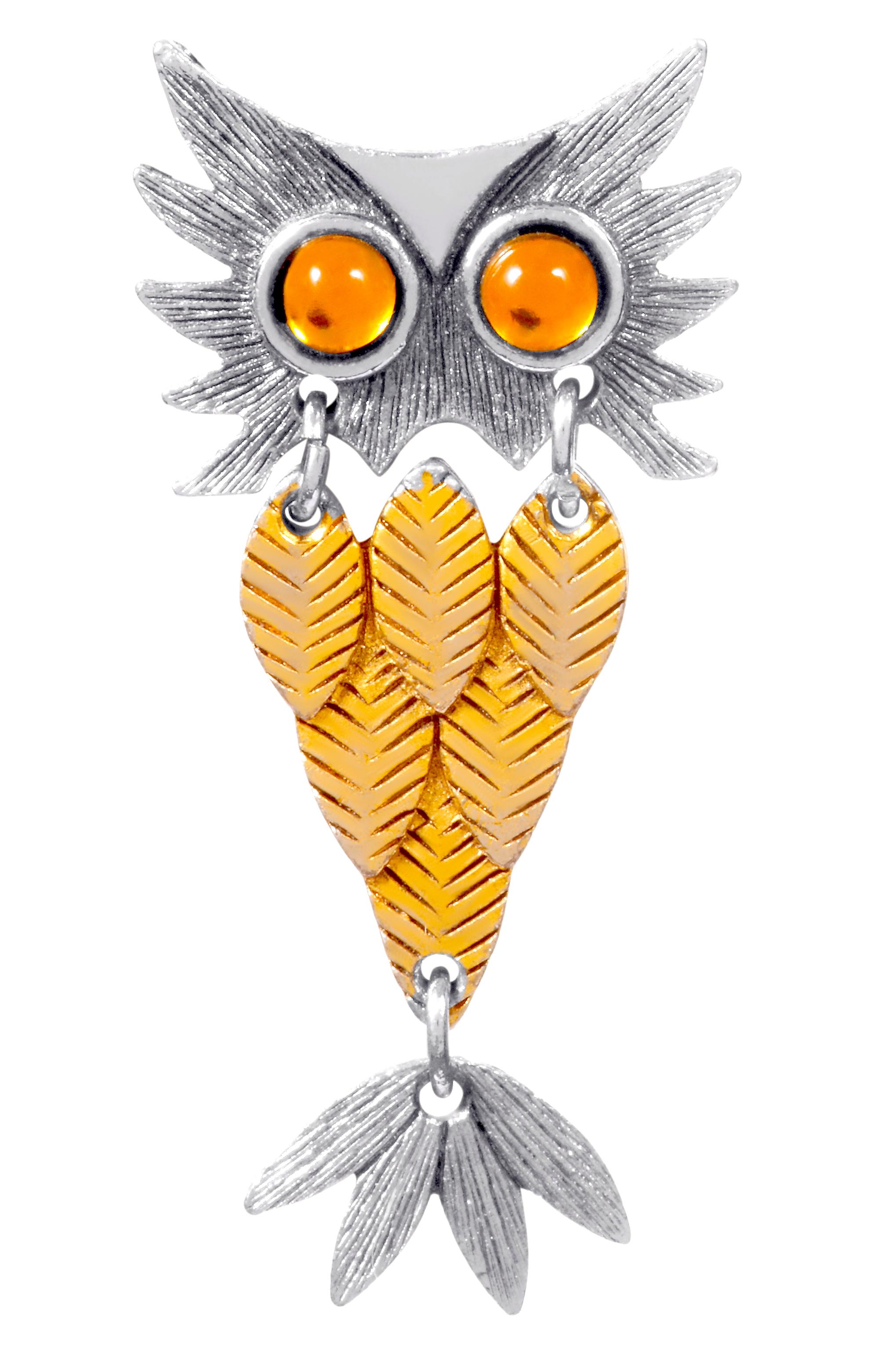 Iconic 1970s articulated owl earrings in silver and gold tone metal. The owl is designed into three sections, each held together with o-rings which give the design a fun and novelty feel.  These well functioning and comfortable clip earrings are