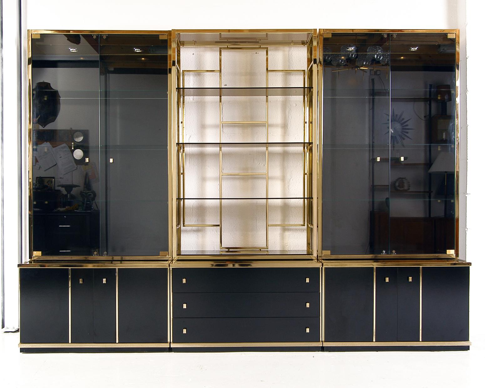 A glamorous piece of furniture designed by one of the masters of 1970s Avant Garde Italy, Renato Zevi. Comprising six individual pieces: a pair of glass fronted vitrines, a pair of two-door cupboards, a five-shelf étagère and a chest of three