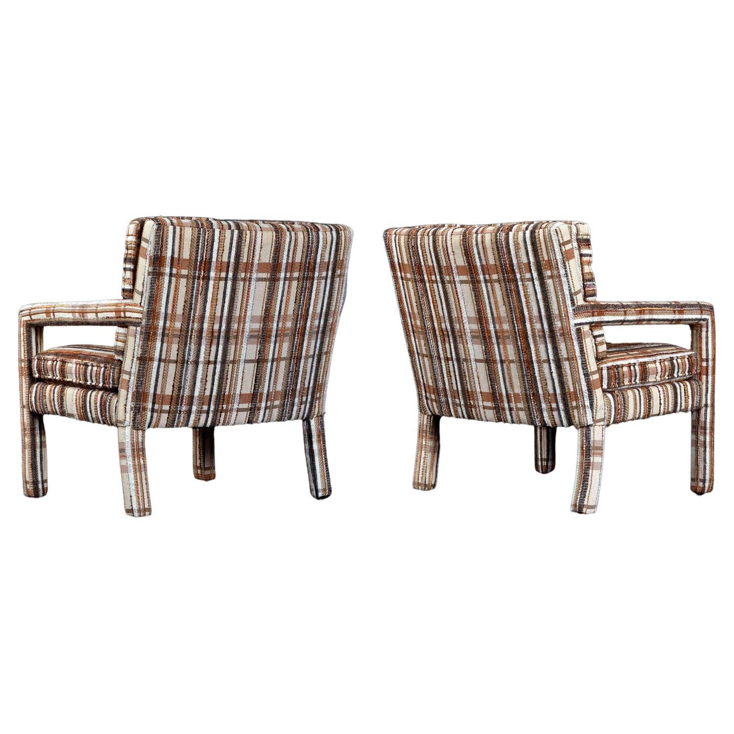 Jacqueline Bisset is watering her potted ferns with a yellow pail as the phone rings. She walks away from the hanging macrame pot holders to a white wicker end table, picks up the receiver and sits down in one of these chairs. It's Charlie, and it's