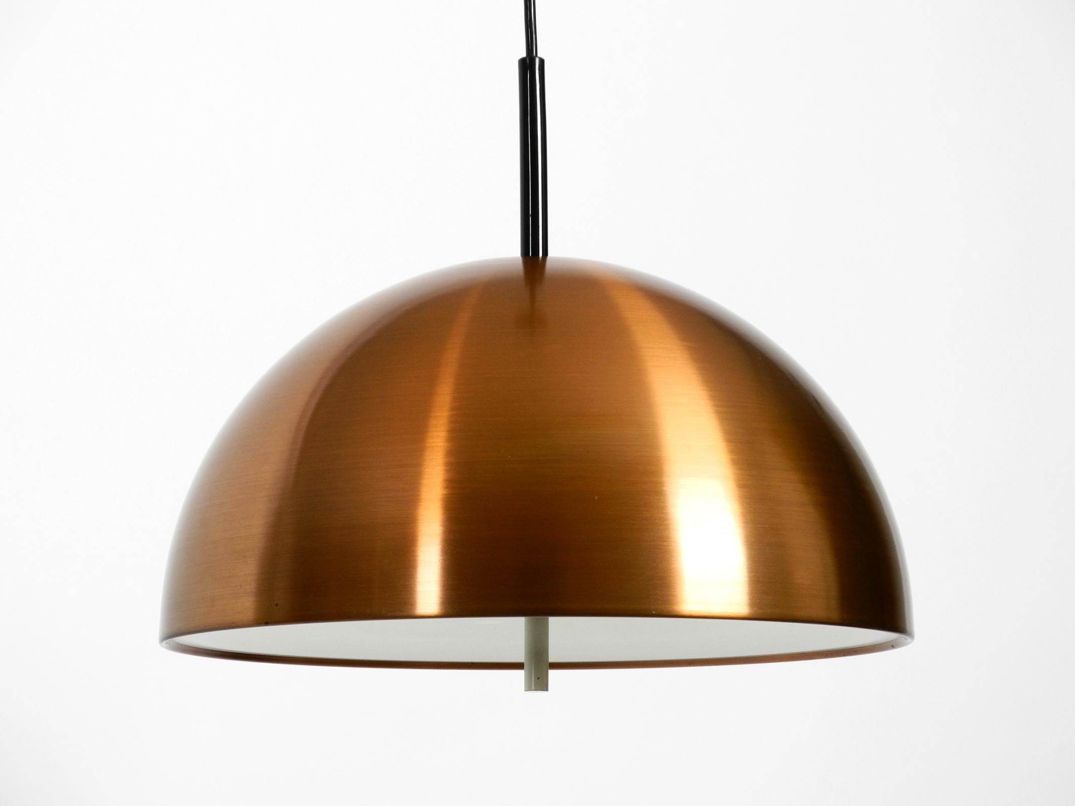 German Original 1970s Space Age Staff Pendant Lamp with Copper Shade in Mint Condition For Sale