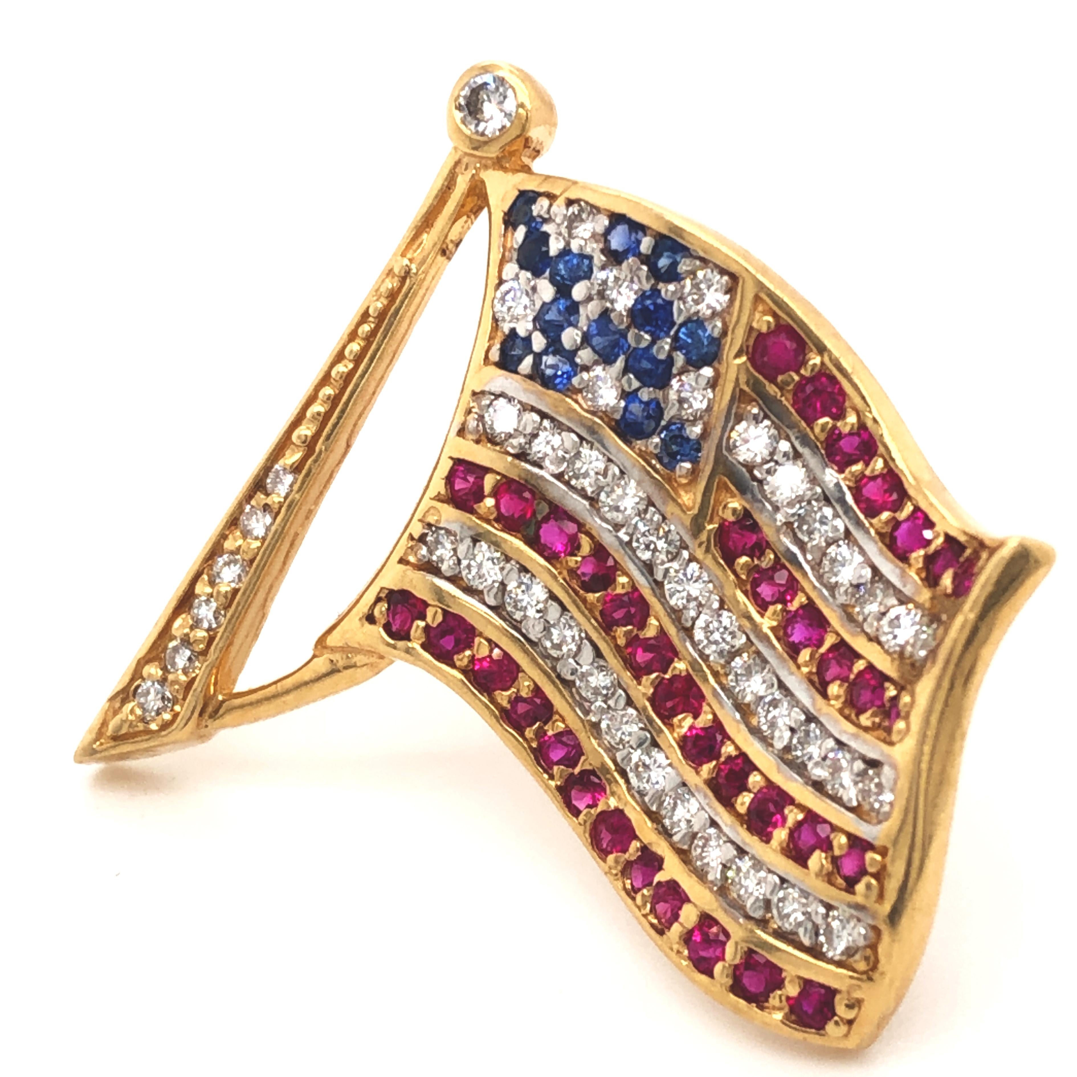 Original 1970 ruby, white diamond and sapphire American Flag 14K yellow Gold setting pin.
A patriotic, timeless classic, perfect with any attire in perfect conditions, as new.
This brooch is featuring 0.15kt, 14 natural blue sapphire, 0.65Kt, 38