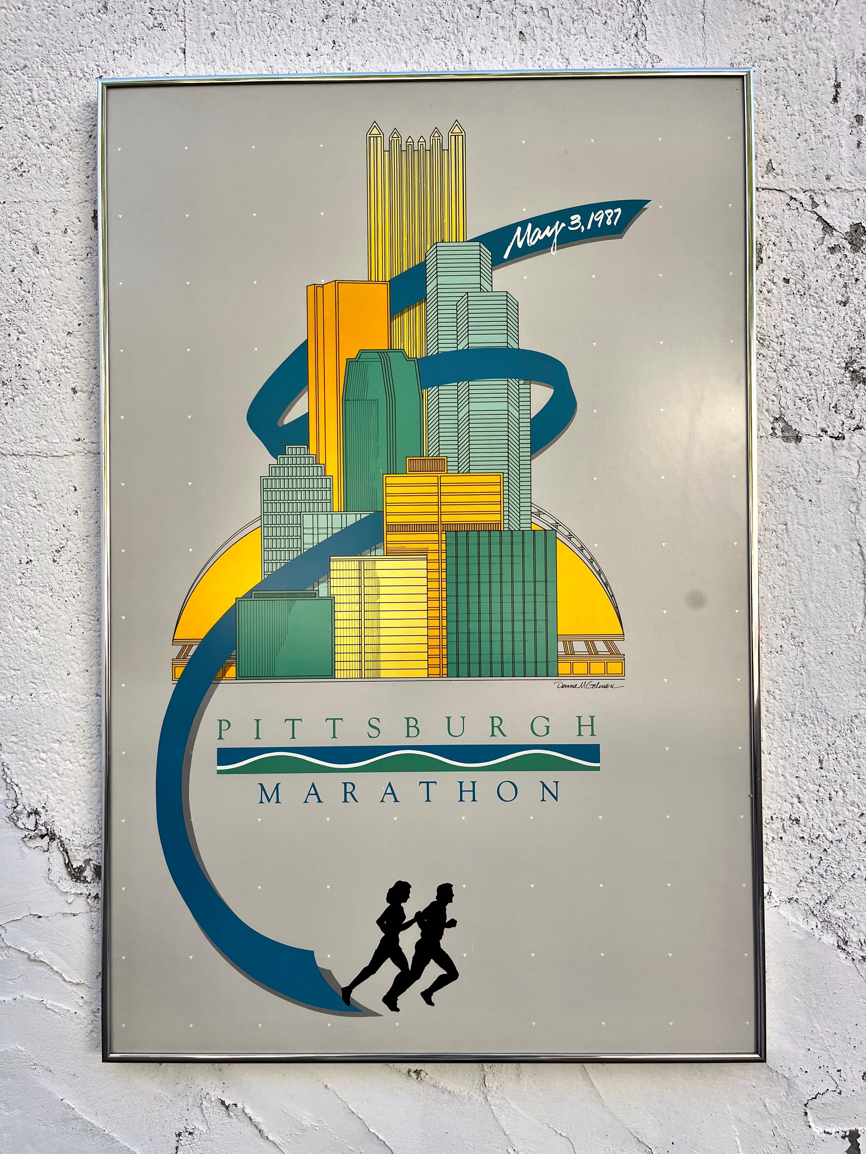 Original 1987 Pittsburgh Marathon Promotional Framed Poster by American Artist Donna M Gelman. 
Features a Modernist illustration of Pittsburgh Skyline over a mute gray background. 
Framed and Ready to hang. 
In Excellent Original Condition with