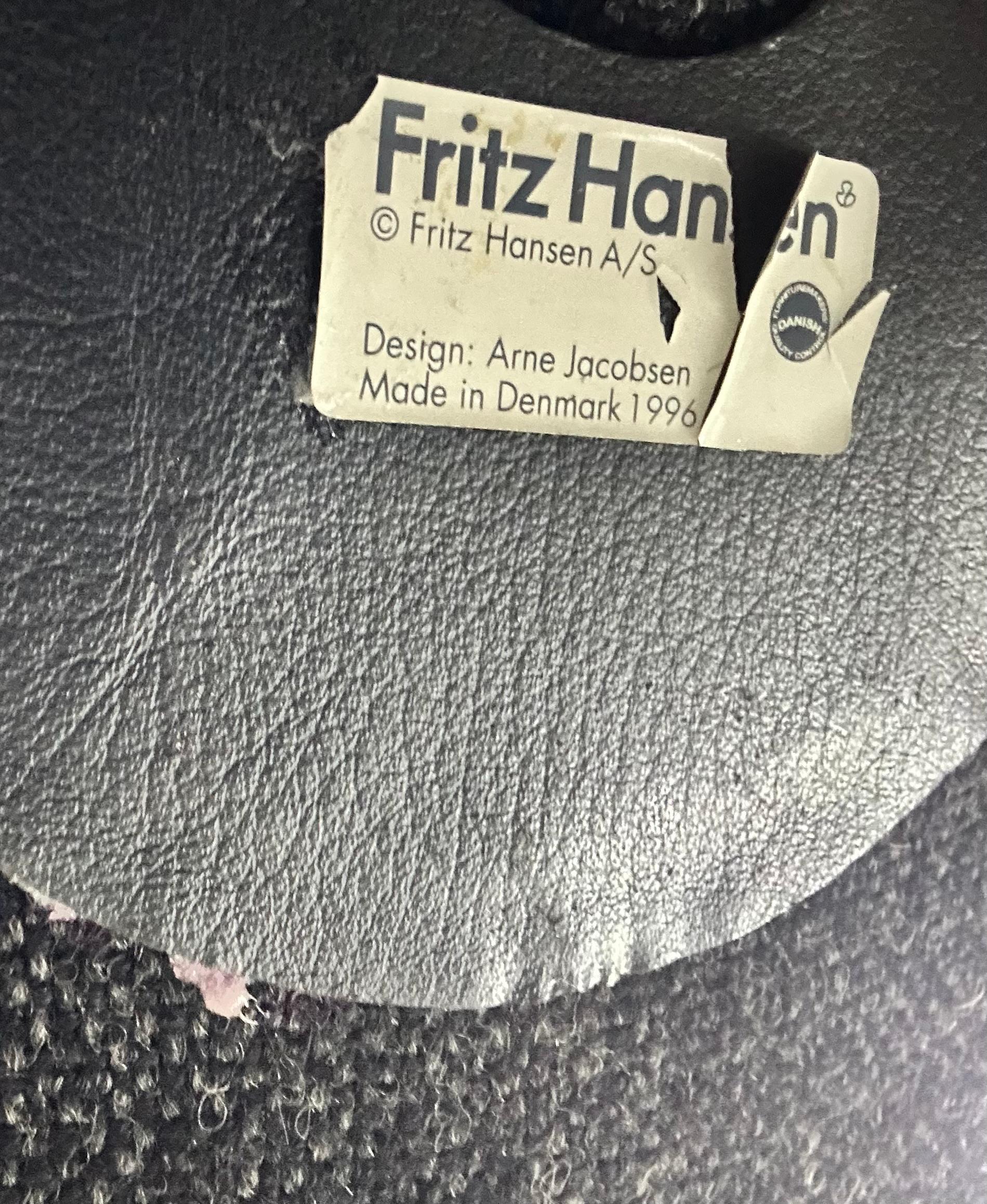We are delighted to offer for sale this original, stamped 1996 Fritz Hansen Egg armchair in grey / black fabric upholstery 

Where to begin! If you are looking at this listing then the chances are you know how rare and important these chairs are,