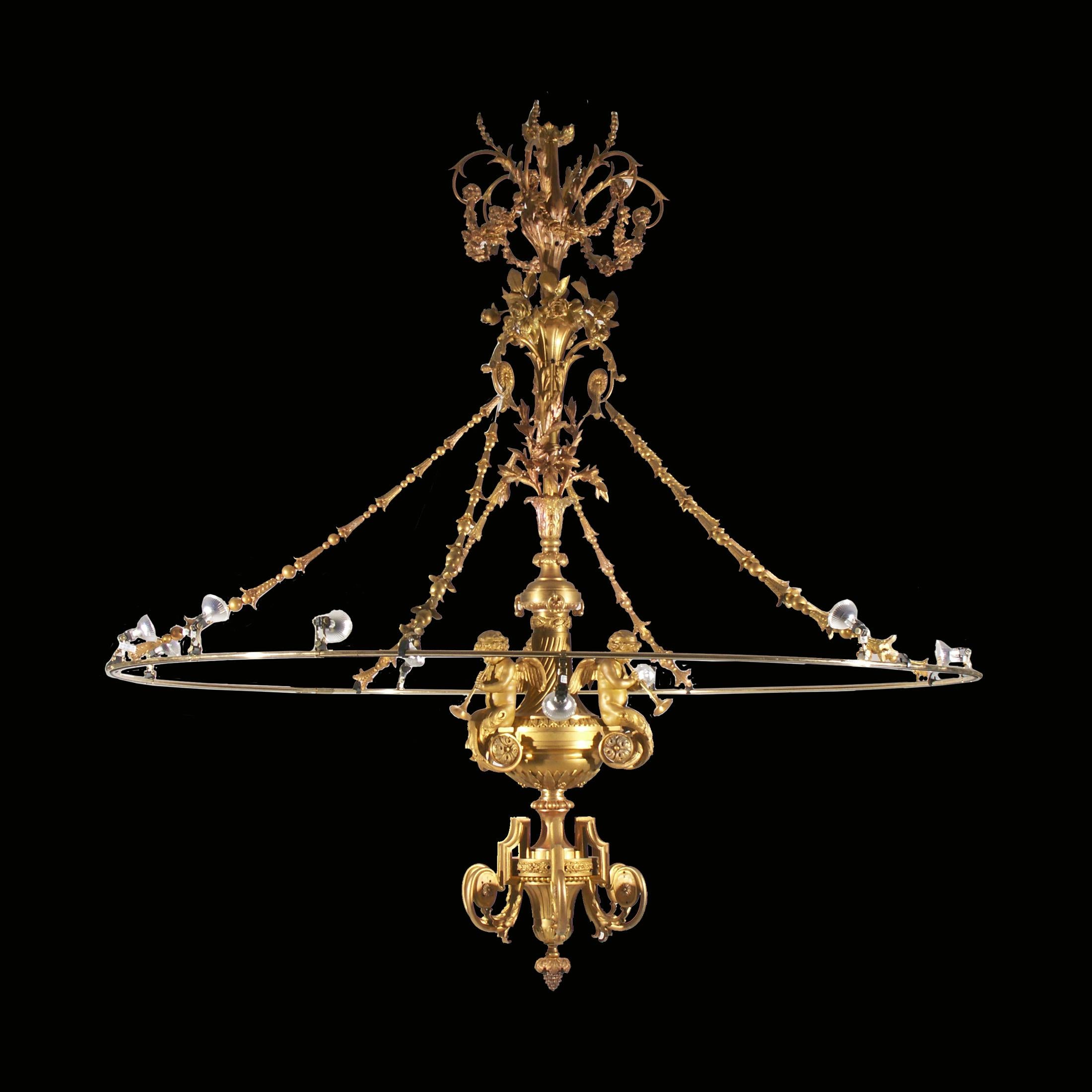 Centerpiece of a magnificent chandelier from a Palace at the Vienna-Ringstrasse, modified with low-voltage spotlights. Very costly work with casted and chased parts. Obviously there were arms originally which were missing. A rim with spotlights was