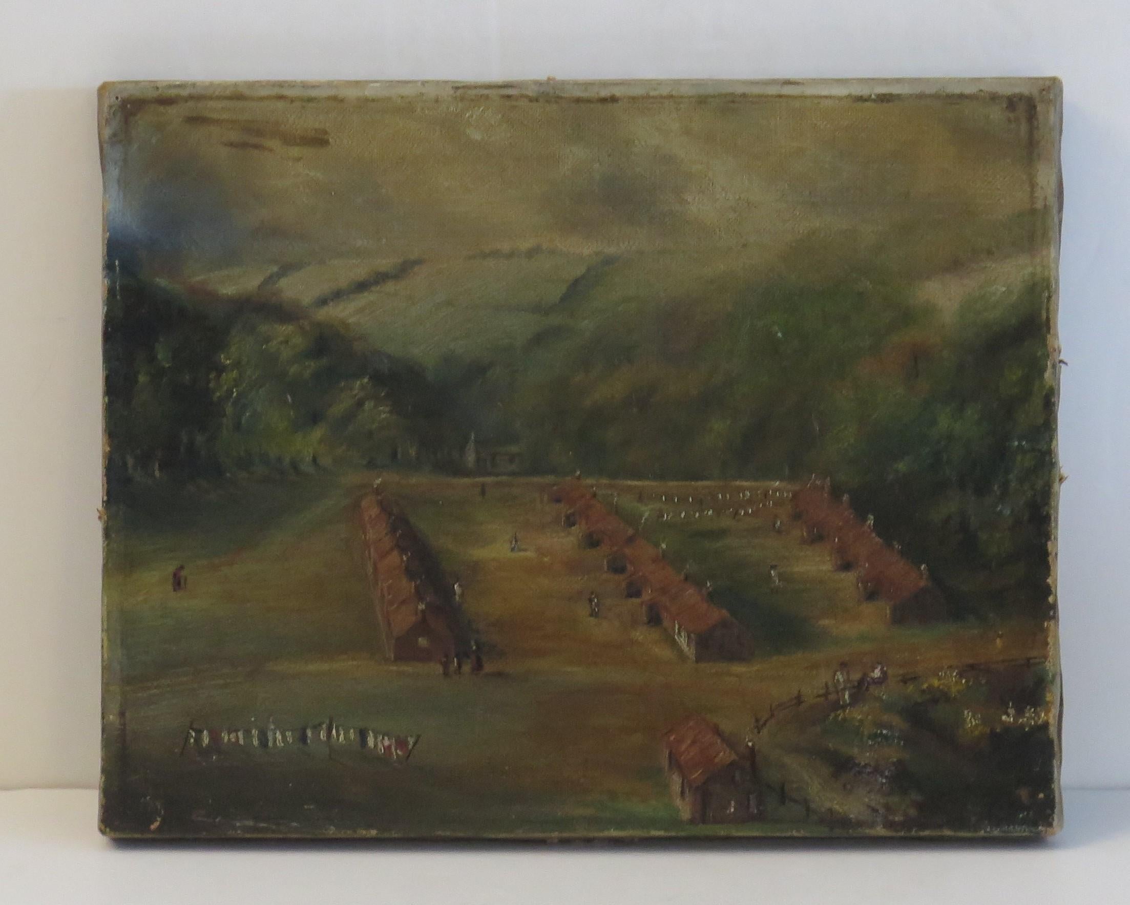 This is a very interesting small antique original, oil on canvas painting, dating to the mid-19th century.

The painting shows a landscape scene of a shanty town of simple buildings, all set in a clearing with woods and high hills in the