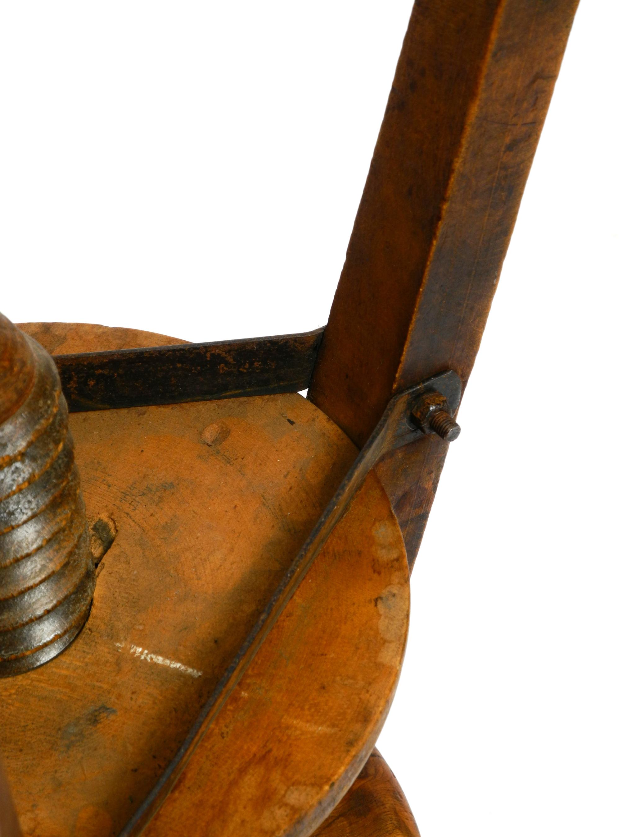 Original 30s French industrial swivel stool made of heavy oak 8