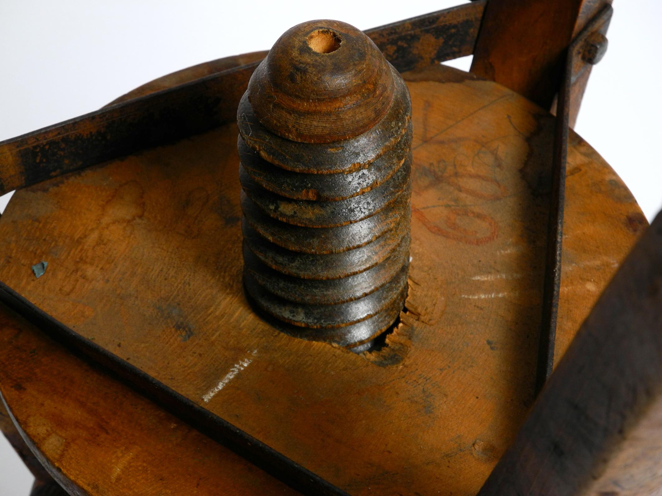 Original 30s French industrial swivel stool made of heavy oak 9
