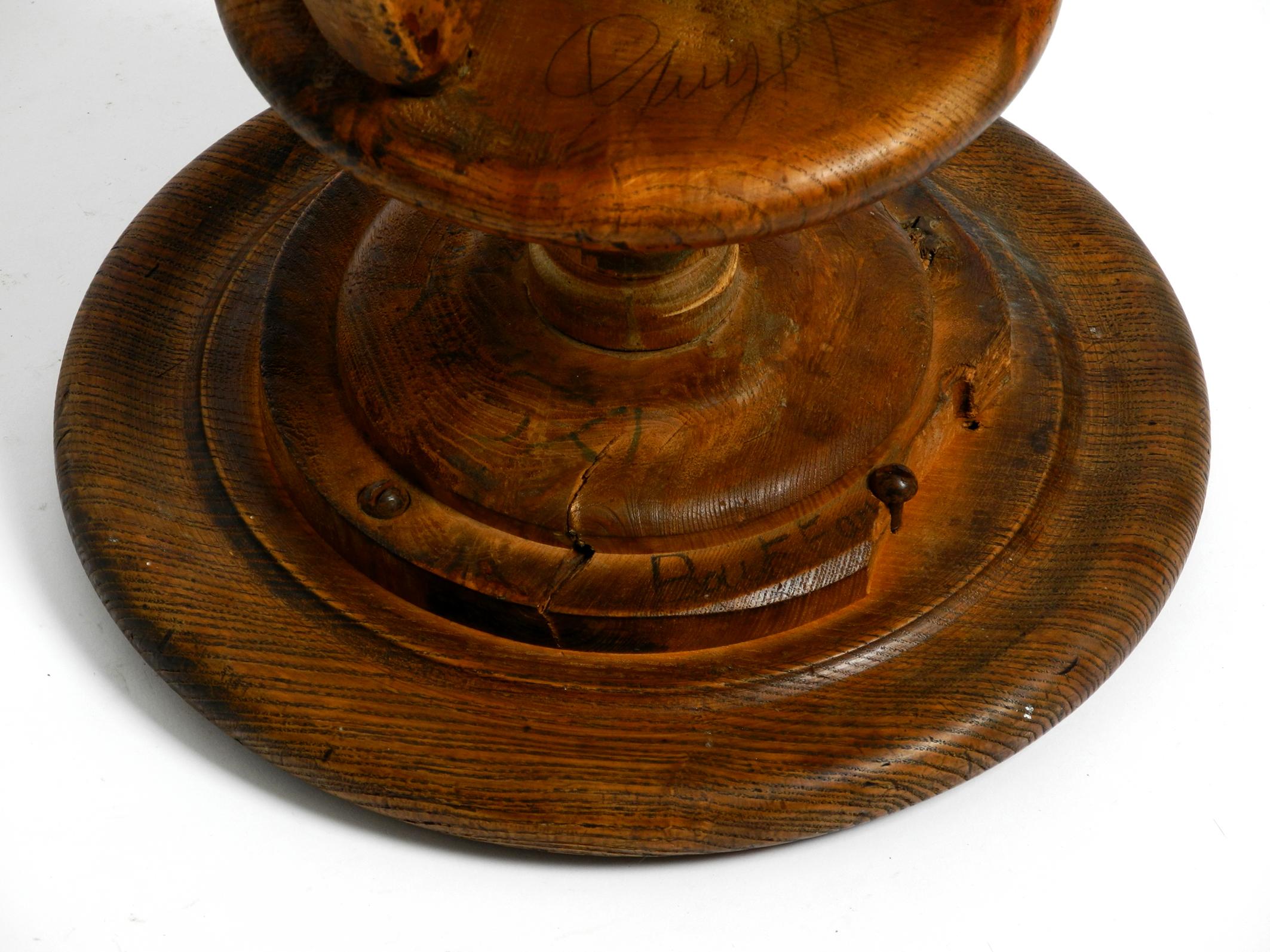 Original 30s French industrial swivel stool made of heavy oak 10