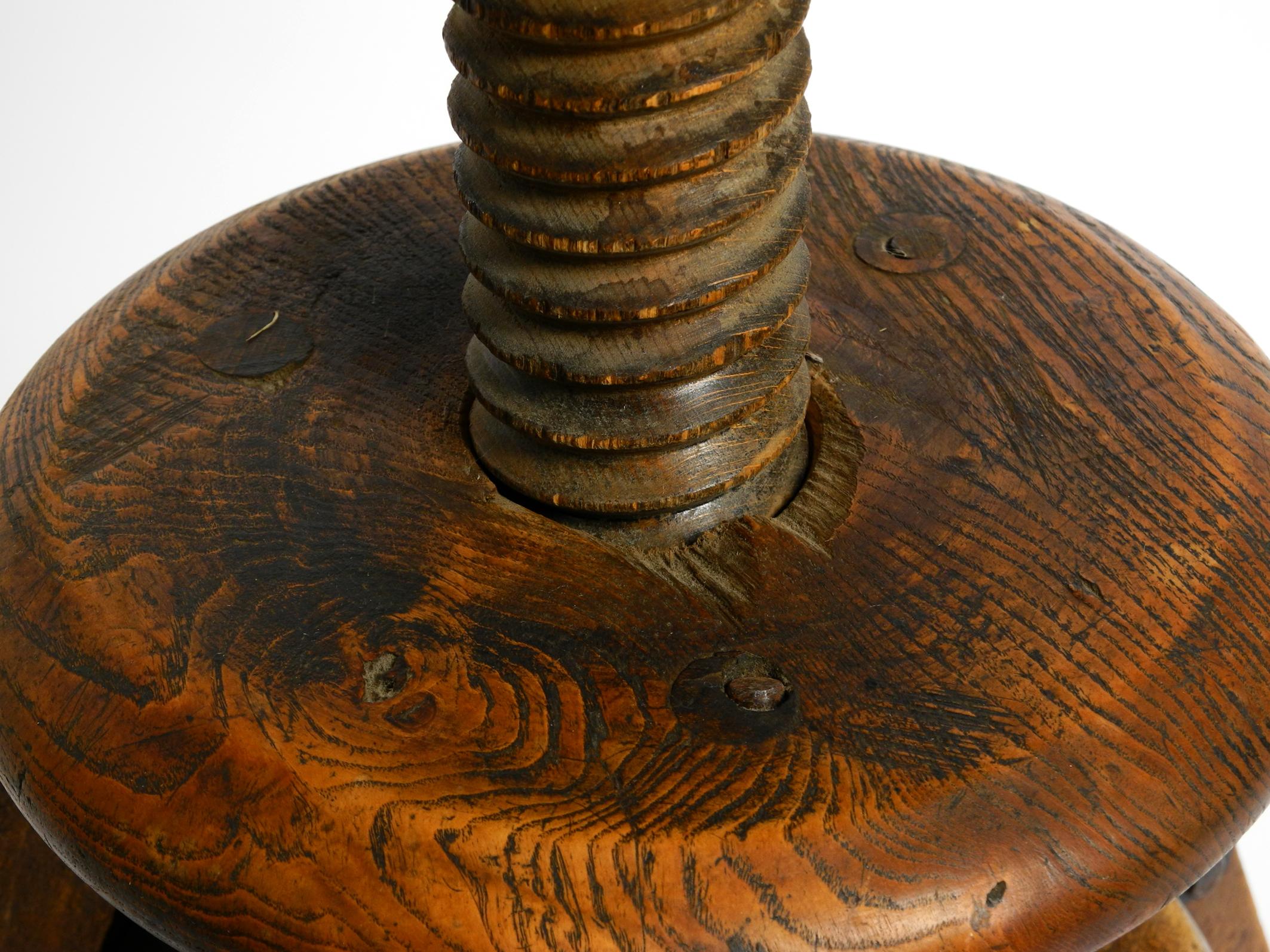 Original 30s French industrial swivel stool made of heavy oak 12