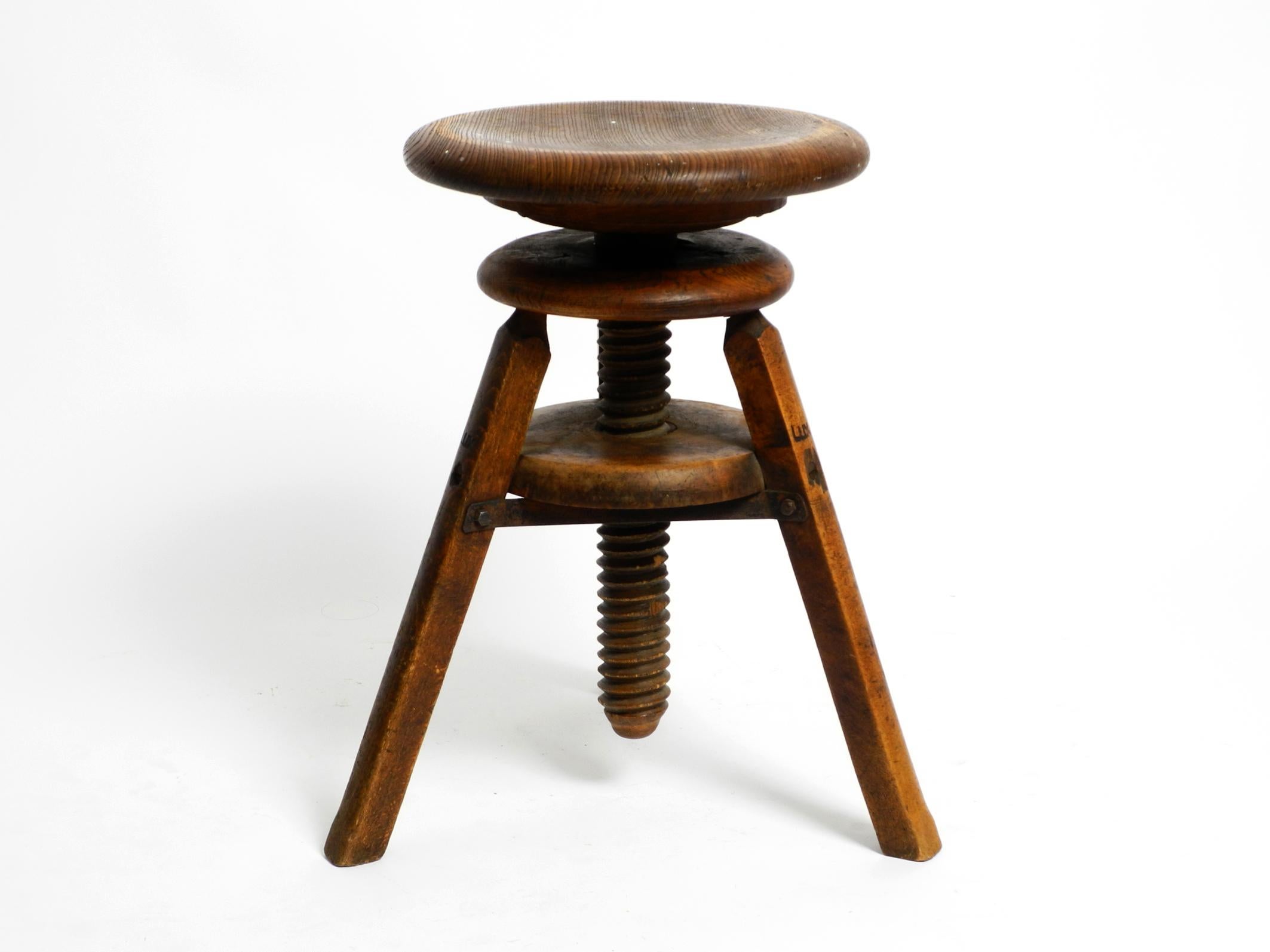 Original 1930s industrial oak swivel stool.
Heavy and solid design. Built to last. Made in France.
Great design and function. Fantastic patina from the last 90 years.
The rotating mechanism works perfectly. Holds at any seat height.
You can see some