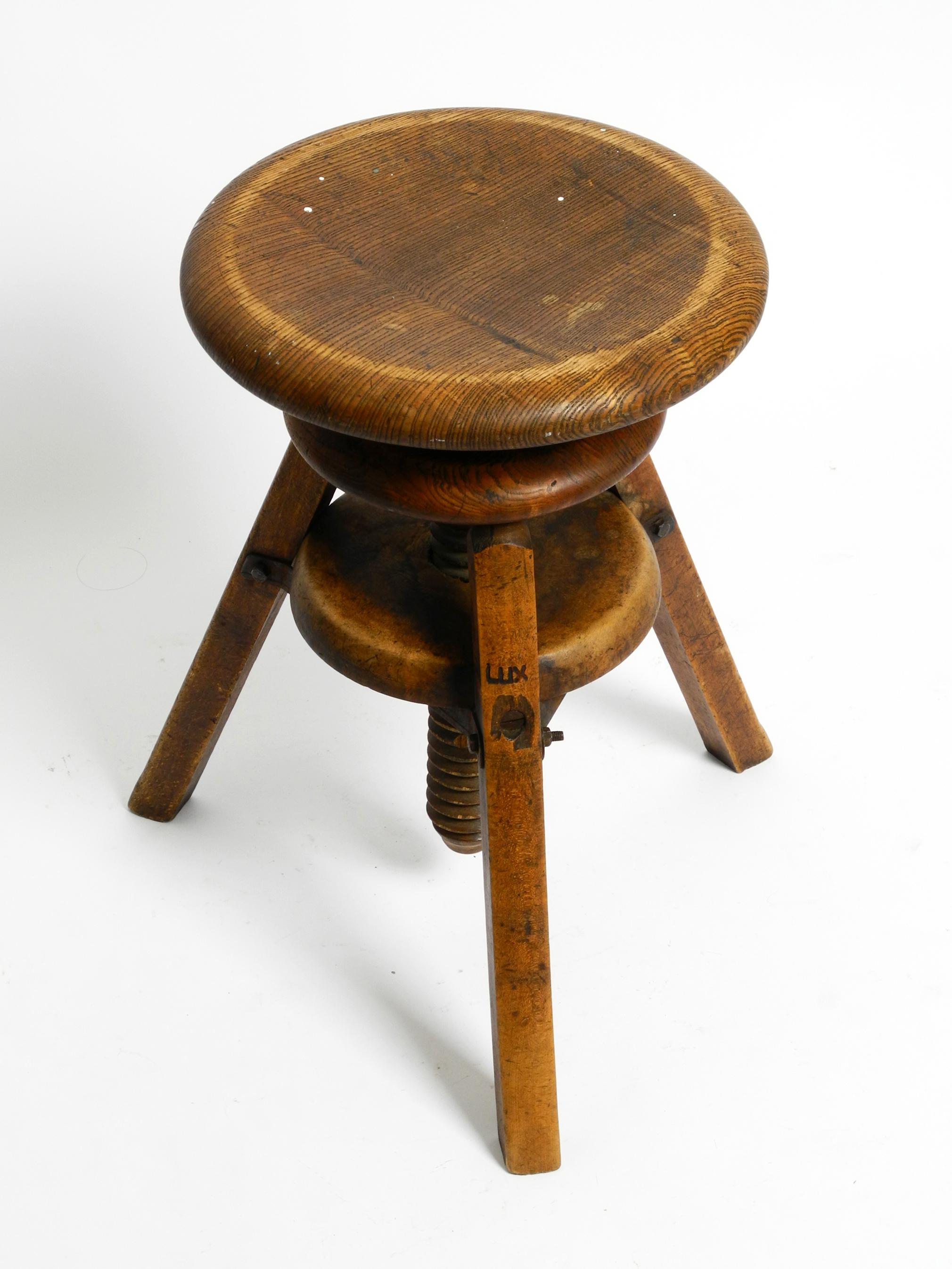 Industrial Original 30s French industrial swivel stool made of heavy oak