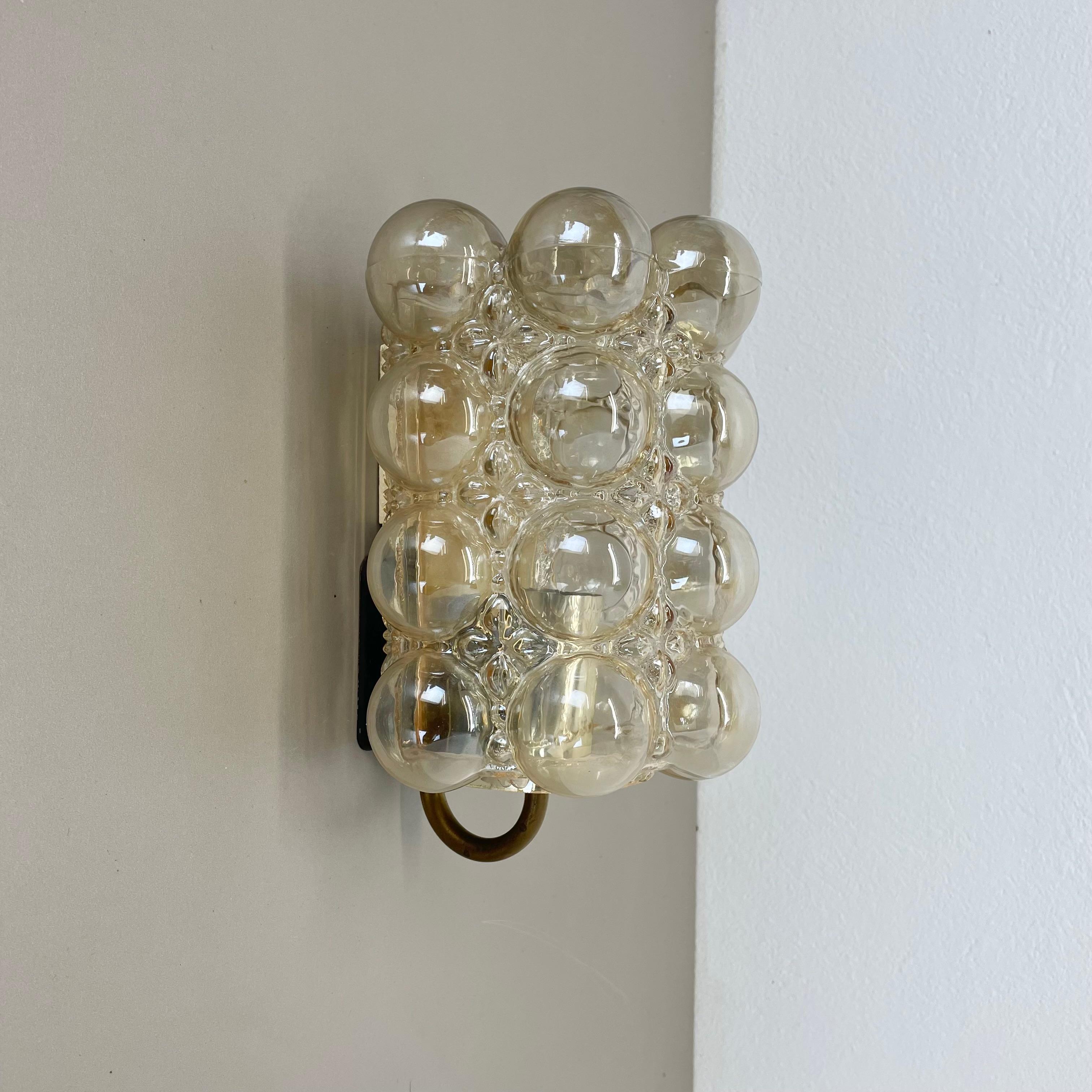 Article:

wall light



Producer: 

Glashütte Limburg, Germany


Design:

Helena Tynell


Origin: 

Germany


Age: 

1970s





This fantastic glass wall light was designed by Helena Tynell and produced in 1960s in Germany by Glashütte Limburg.

The