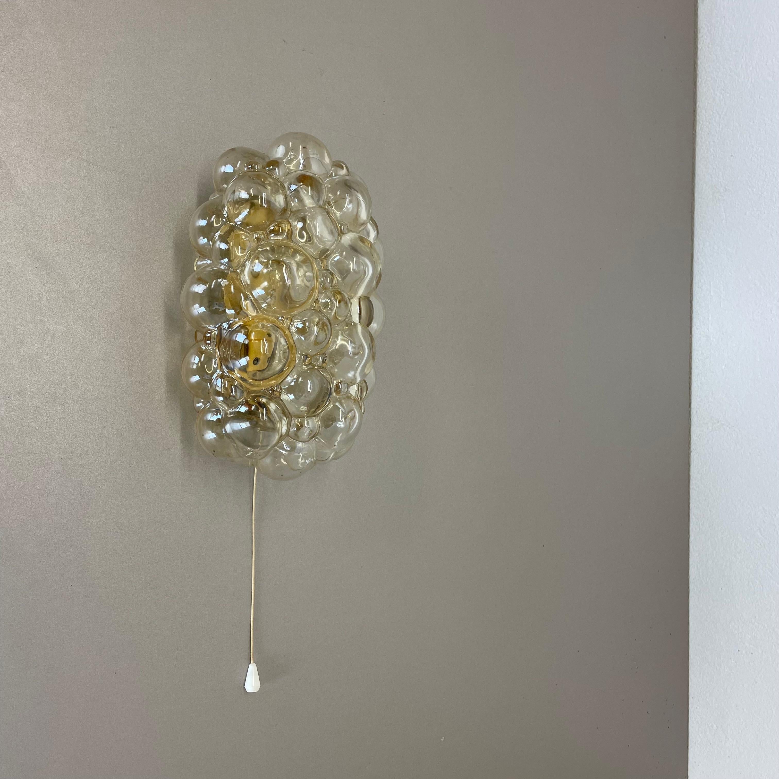 Article:

wall light



Producer: 

Glashütte Limburg, Germany


Design:

Helena Tynell


Origin: 

Germany


Age: 

1960s





This fantastic glass wall light was designed by Helena Tynell and produced in 1960s in Germany by Glashütte Limburg.

The