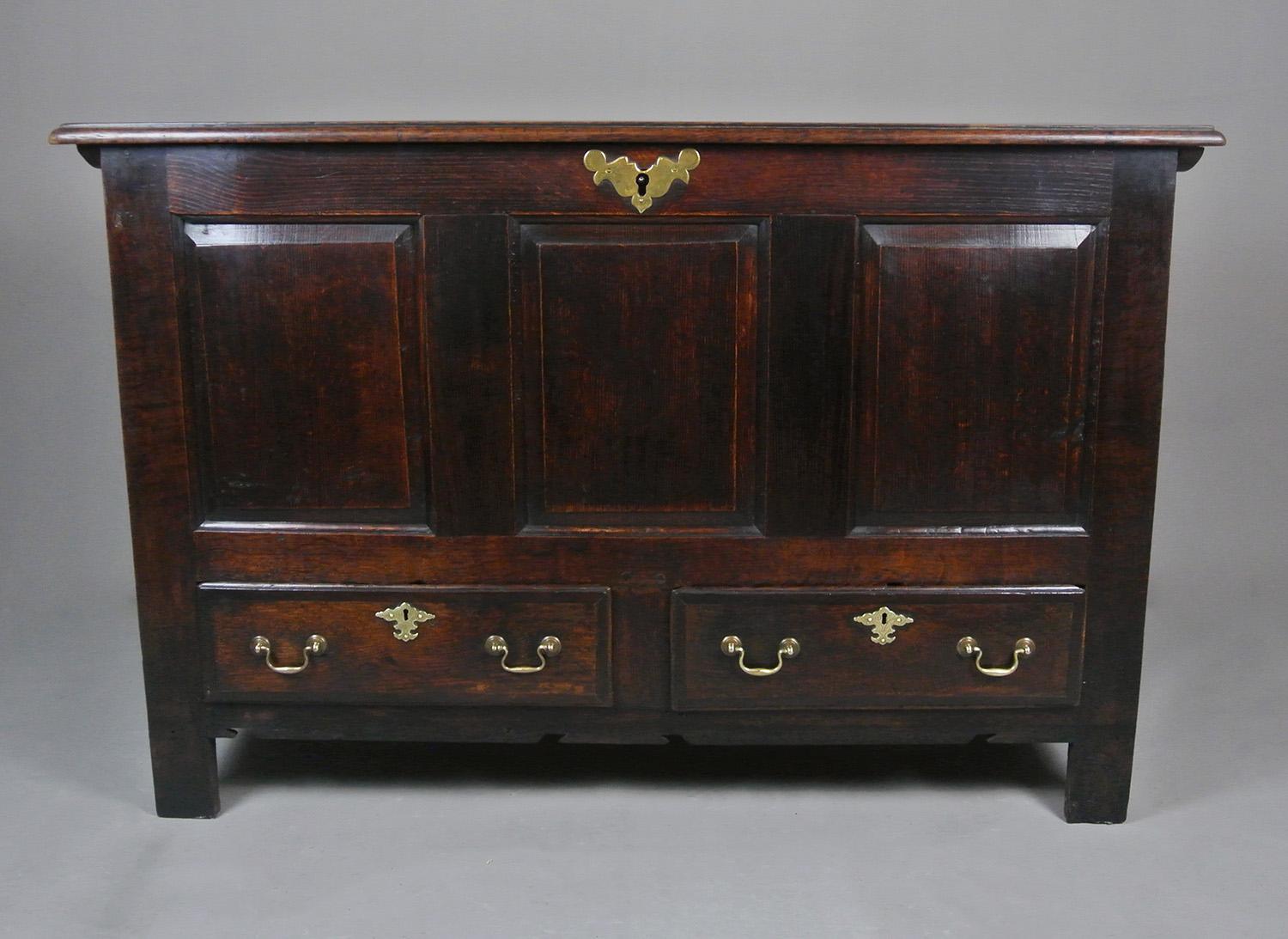 A really good mid 18th century oak mule chest of lovely proportions and with a fantastic well developed natural and rich colour. The drawers with original handles and the chest with its original escutcheon, the engraved pattern worn from regular
