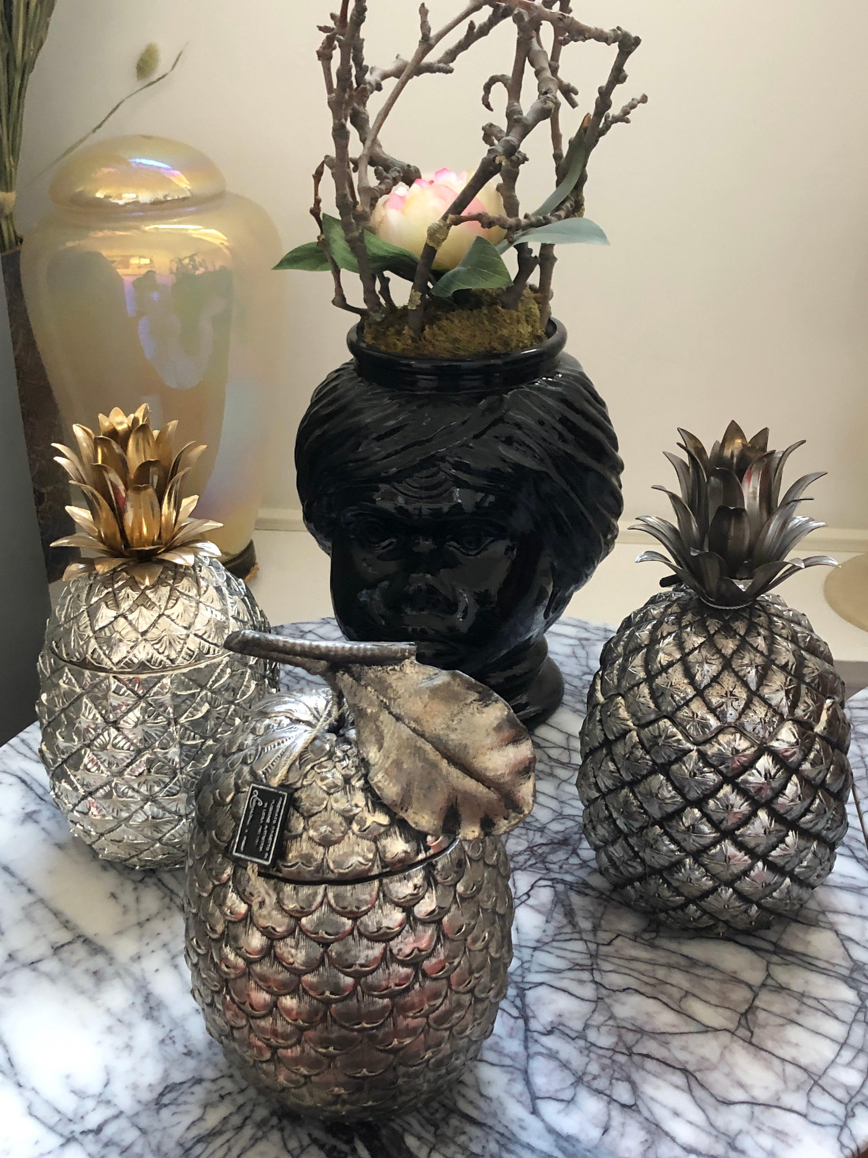 Large pineapple ice bucket designed by Mauro Manetti manufactured by Fonderia d'Arte Firenze in 1950.
As you see the inside, this piece has never been used and still have it original label on one side is written:
Fonderia d'Arte Firenze Mauro