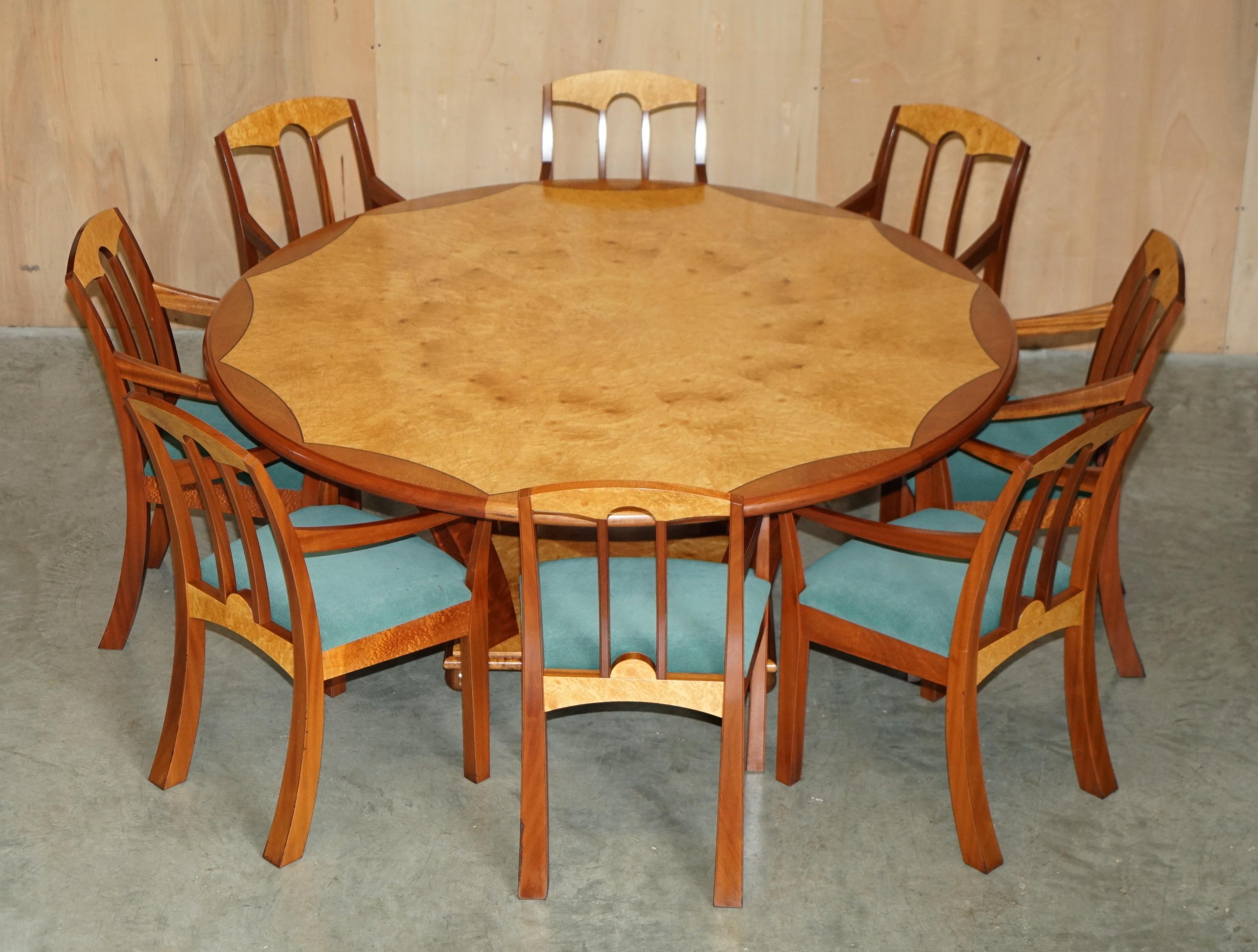Royal House Antiques

Royal House Antiques is delighted to offer for sale this sublime designer Andrew Varah eight person extra large dining table with matching suite of carver armchairs made in Burr Walnut and Amboyna wood

Please note the delivery