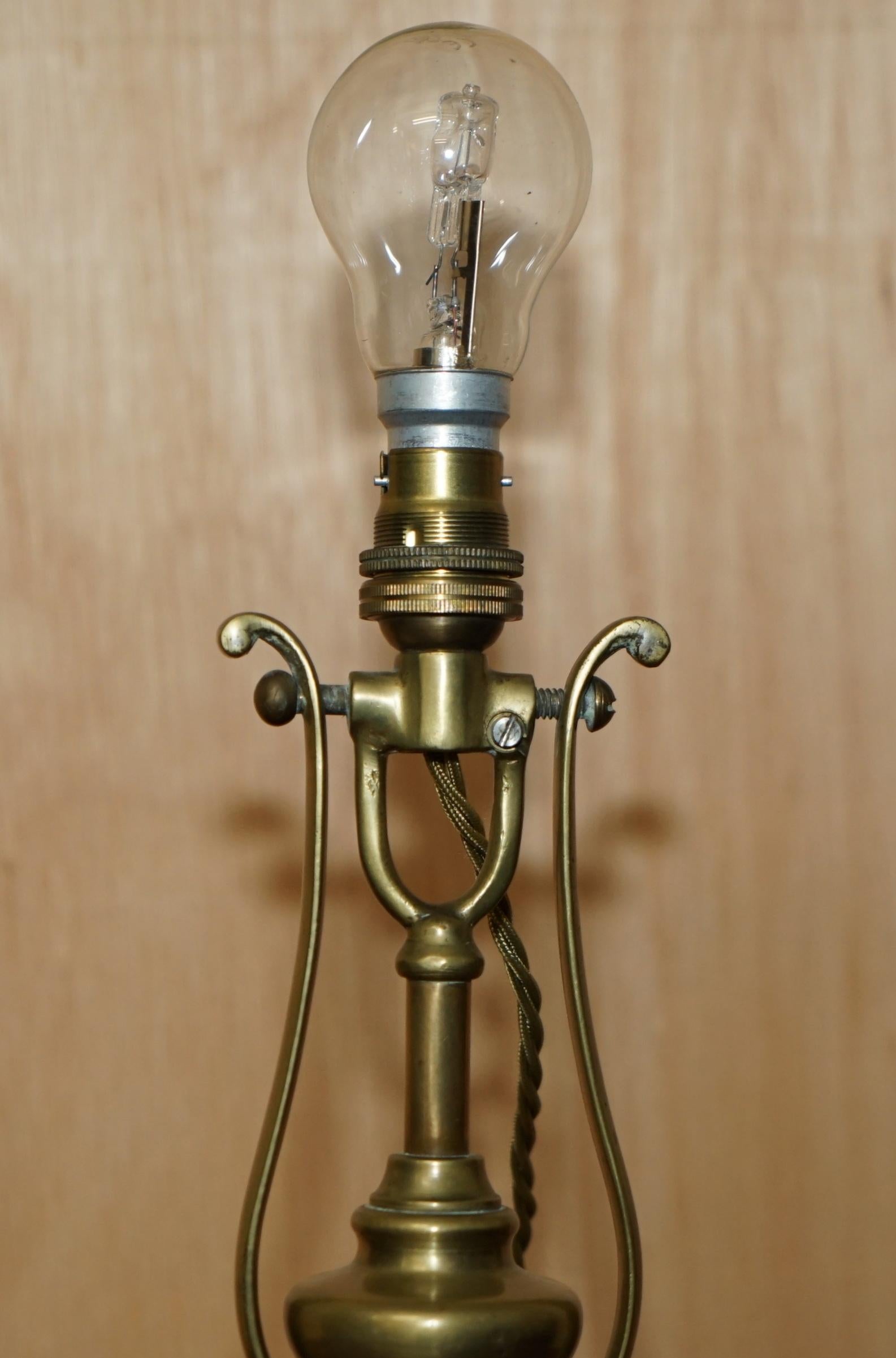 Royal House Antiques

Royal House Antiques is delighted to offer for sale this exquisite original circa 1925 Antique Brass Gimbal Ships Master Suite wall or table lamp in fully restored condition 

A very good looking and well made, versatile lamp,