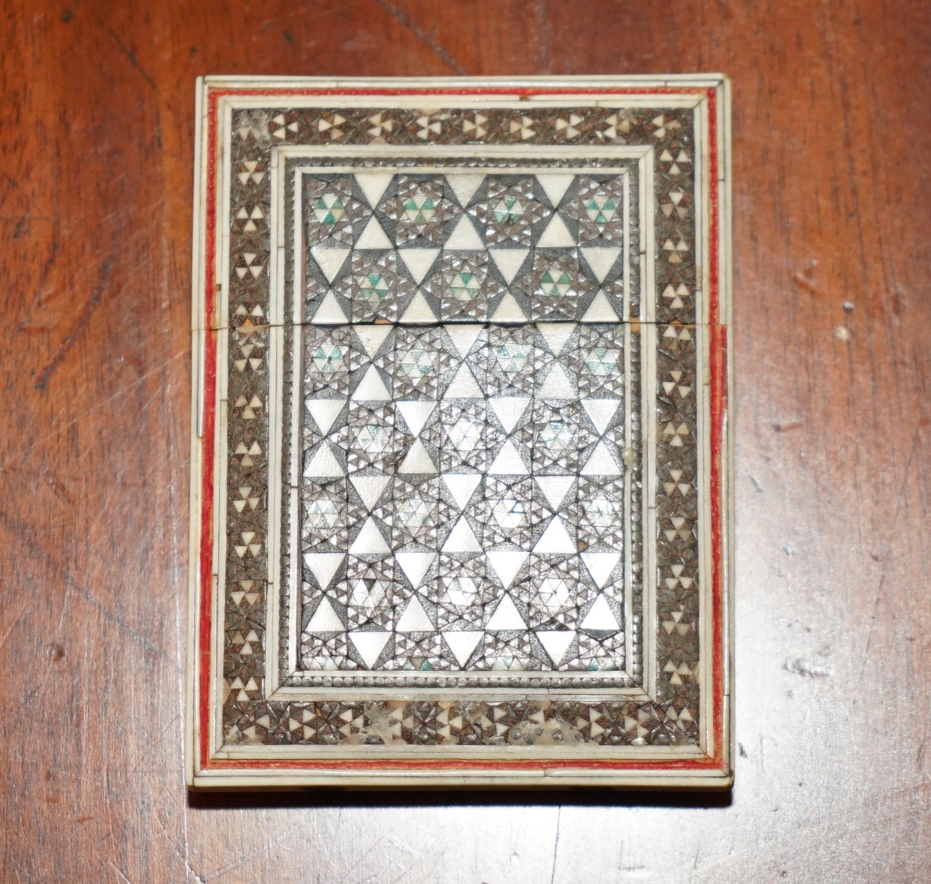 Royal House Antiques

Royal House Antiques is delighted to offer for sale this lovely, super decorative antique Islamic Anglo Indian Sadeli Micro Mosaic Card Case

A wonderfully original find, this isn’t one of the much later reproductions but a