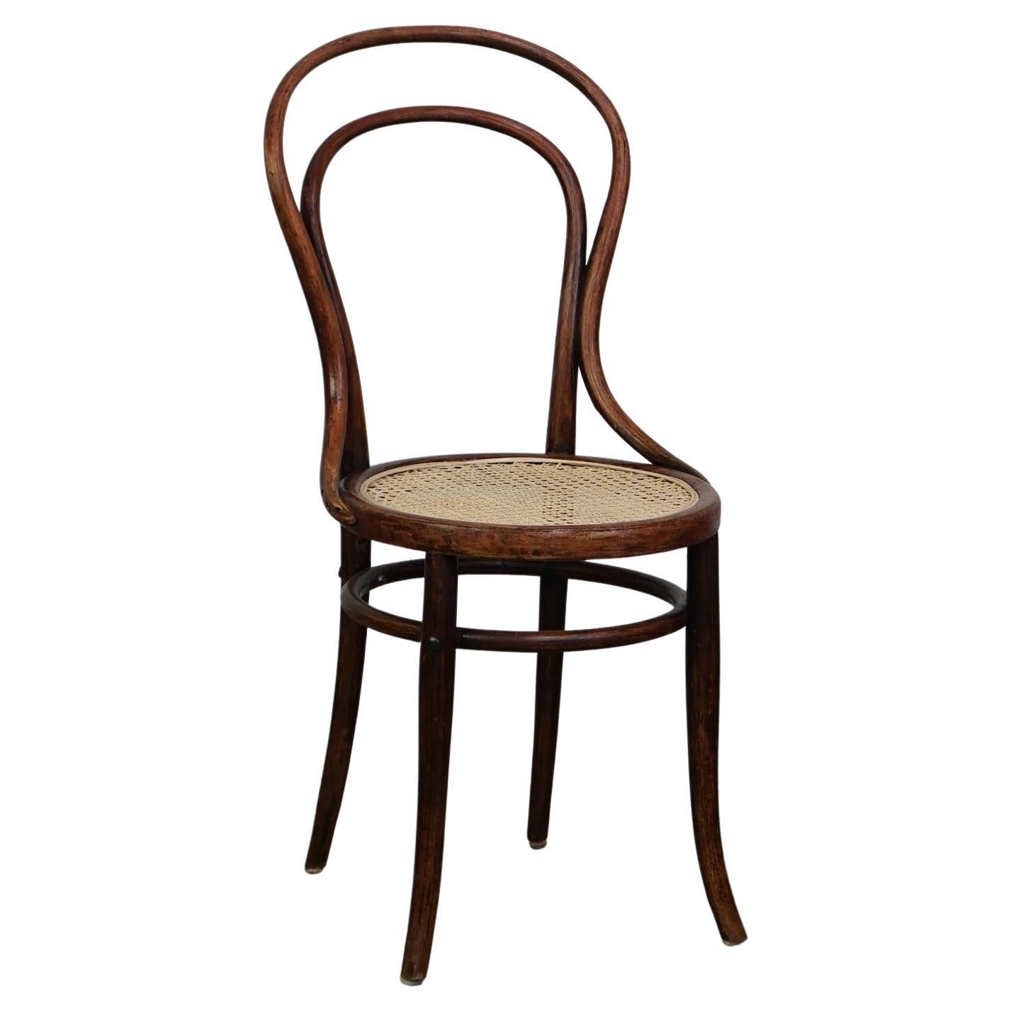 Original antique bentwood Thonet bistro chair model no. 14 with a new matte seat For Sale
