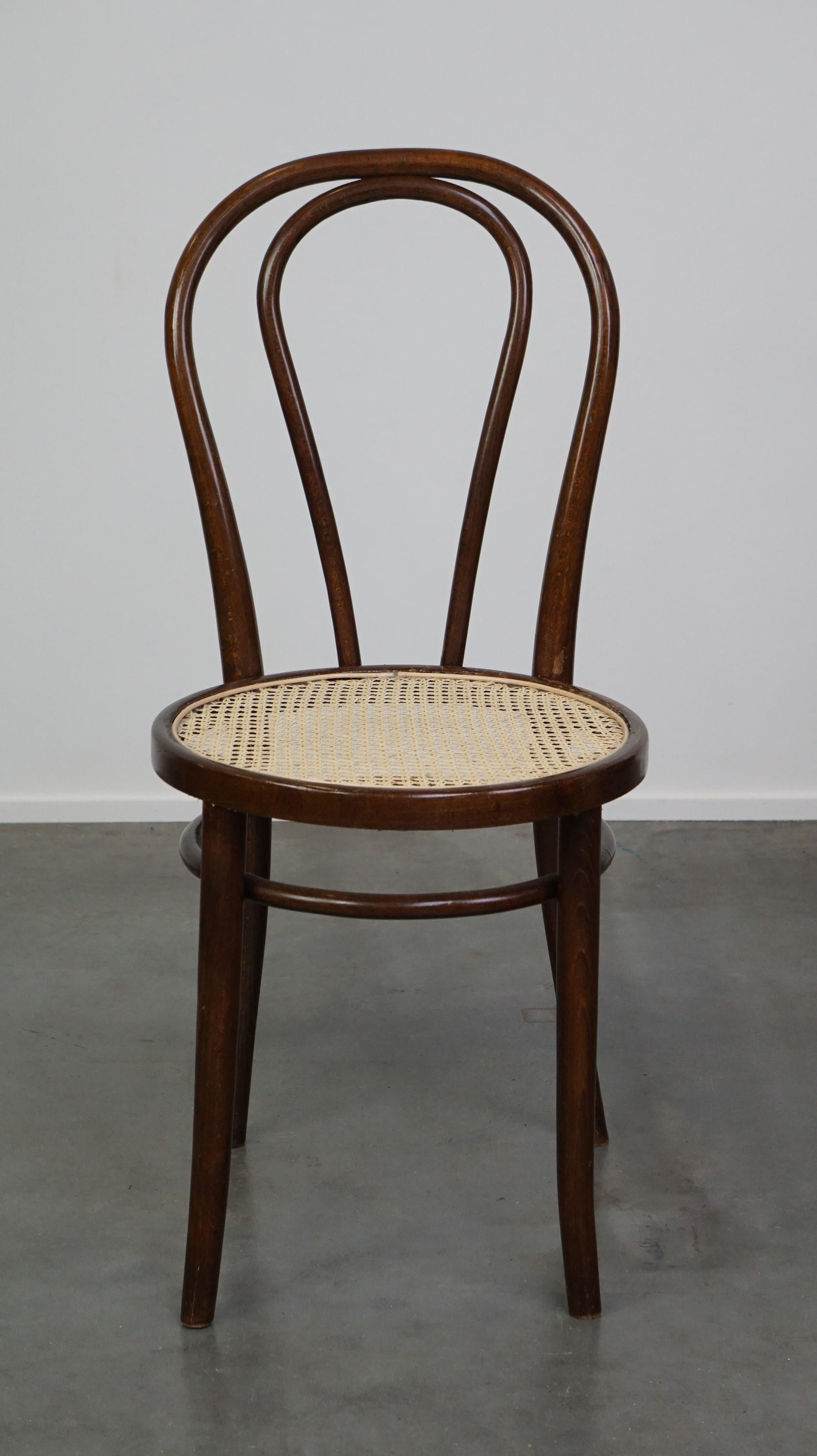 Chair no. 18, also known as the bistro chair, designed by Thonet, was one of the most famous chairs alongside chair no. 14. They both have a half-rounded backrest. This chair was produced by the Austrian designer Josef Hoffmann, probably around