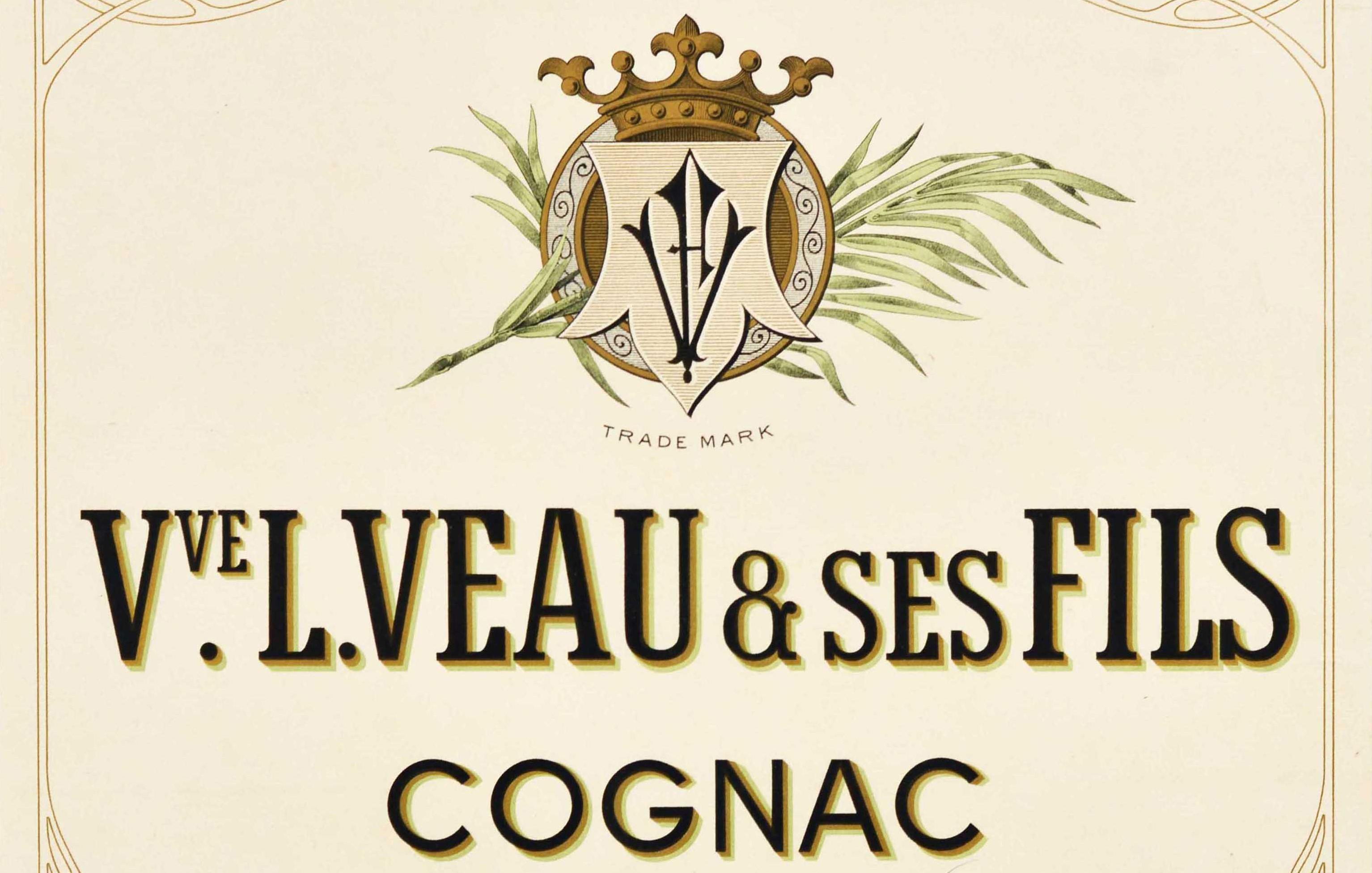Original antique alcohol drink advertising poster for Veuve L. Veau & Ses Fils Cognac featuring the bold stylised lettering below a trademark logo of intertwined letters in front of a green branch and crown at the top of the decorative circle.