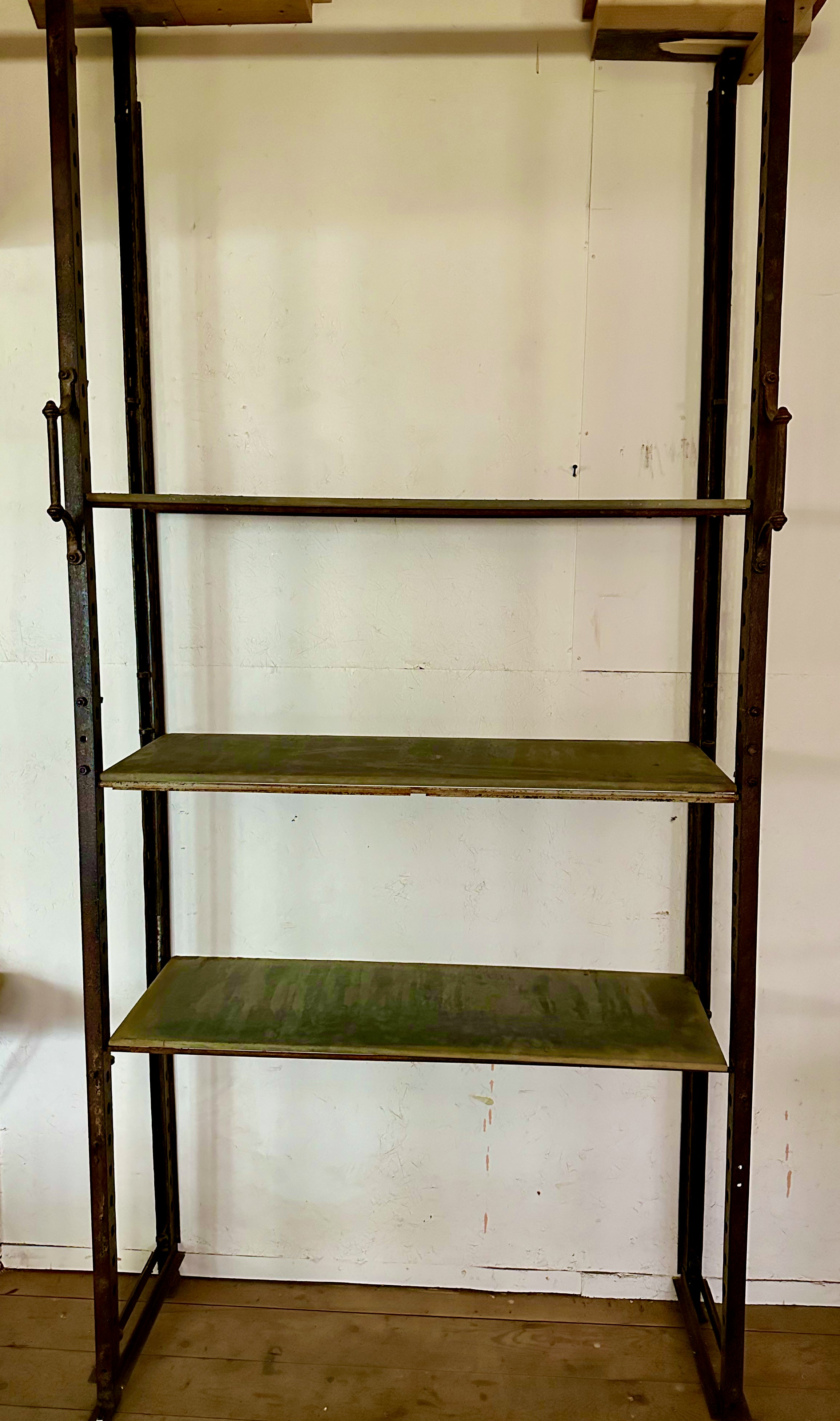 Make a statement with this hard to find, original antique industrial shelving from the archives of government building in the Netherlands.  The shelves are the original slate  used for shelving purposes at the time.  This unit comes with 4 slate