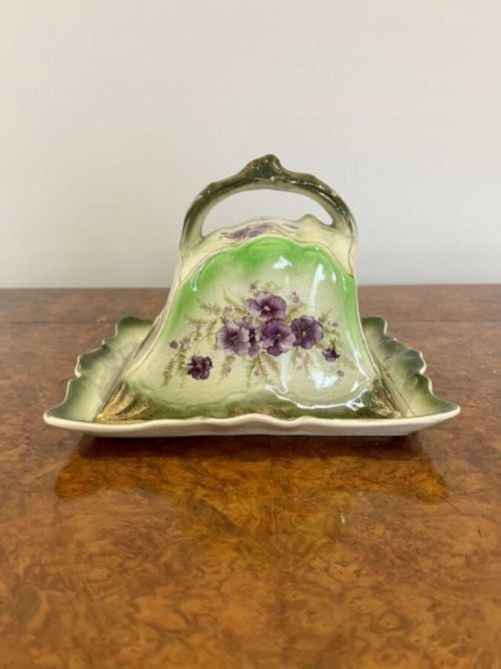 Original antique Edwardian cheese dish and cover having a original antique cheese dish and cover in wonderful floral decoration in hand painted green, purple, gold and white colours 