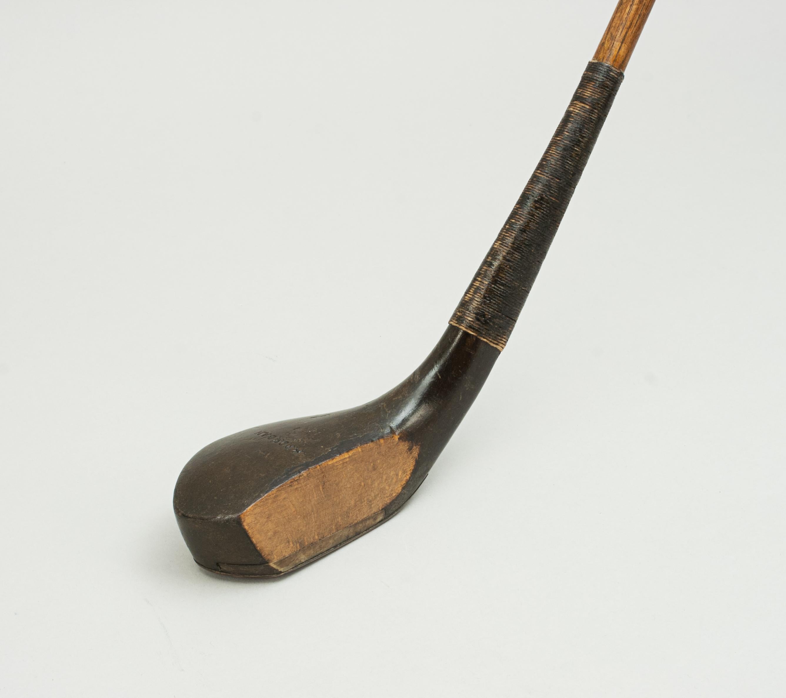 Antique long nose, deep faced golf club, Robert Forgan, St Andrews.
A very good beechwood long nose deep face golf club, long spoon by Robert Forgan of St Andrews. This great looking club has lead weight to the rear and the traditional horn slip