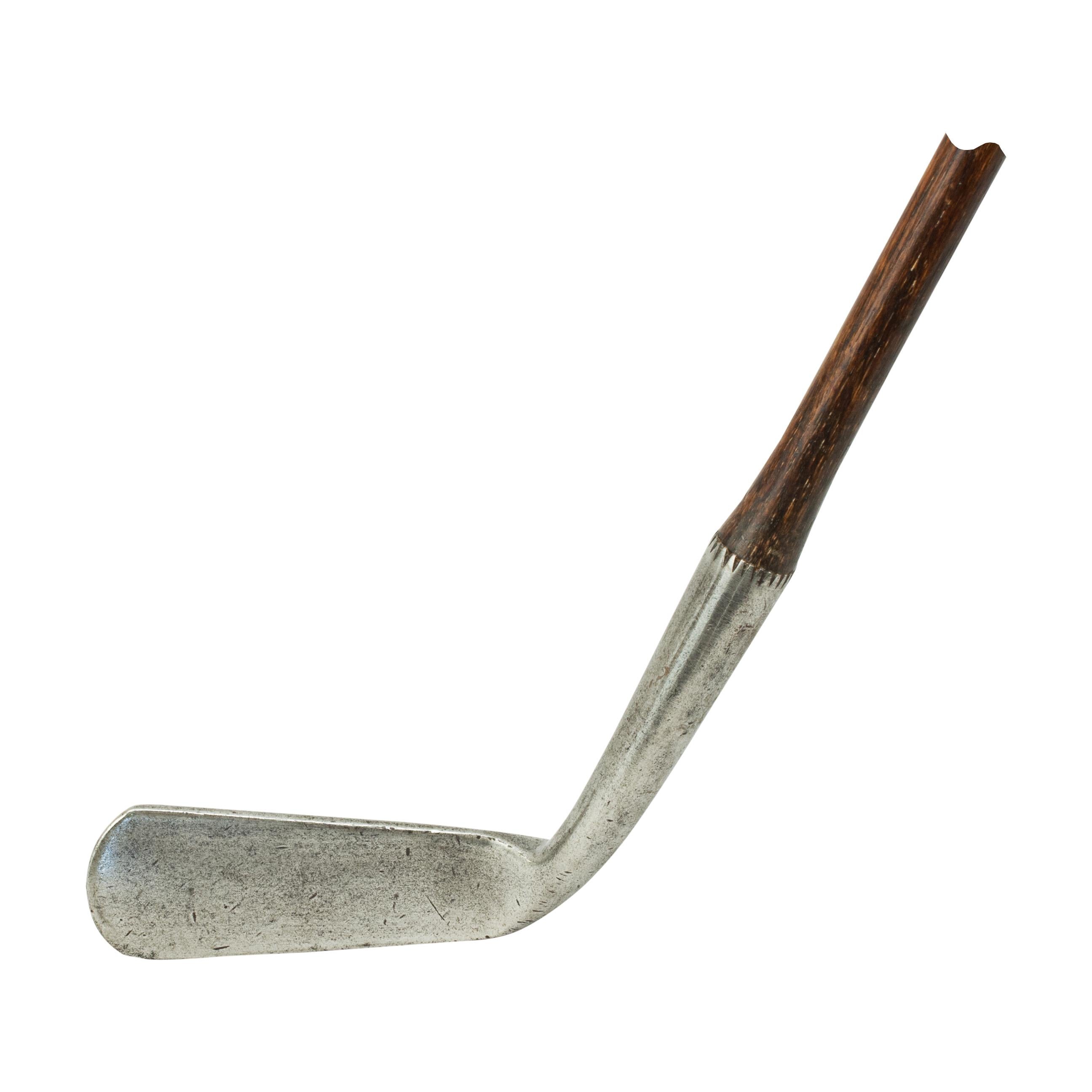 Vintage Hickory Golf Club, Wry Neck Putter, Willie Park, St Andrews.
A fine and nicely weighted smooth faced offset putter by Willie Park of St. Andrews. Hickory shafted with leather grip. On the rear of the club head is stamped 'W. Park, Special,