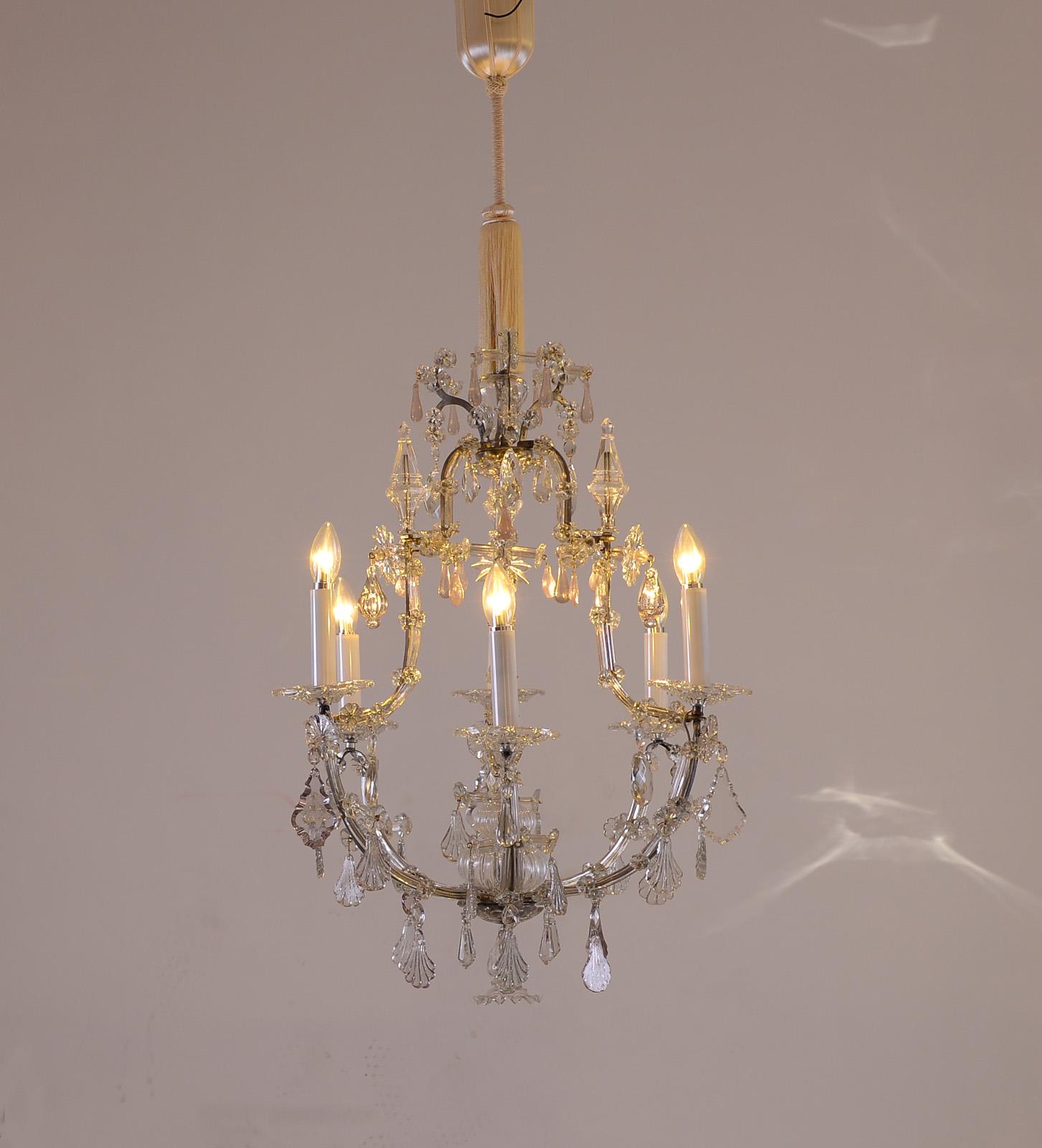 Antique Rococo chandelier, with zinn-plated iron frame, partly with rose resin-hanging - restored

Wired for the US.