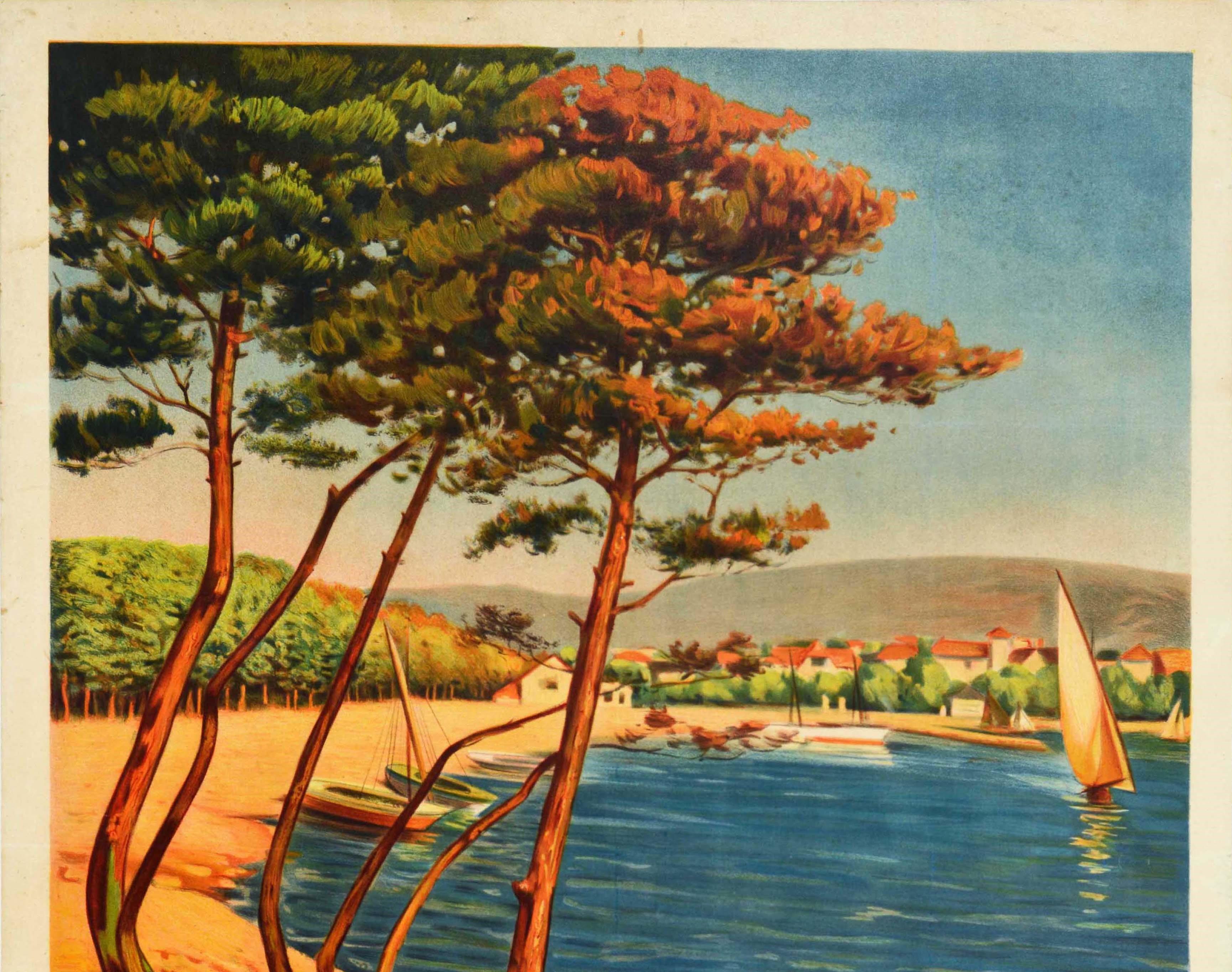 Original antique travel poster for the seaside resort village of Carry Le Rouet located 25km from Marseille featuring a scenic view of sailing boats at sea with trees in the foreground and hills in the distance behind the houses on the other side of