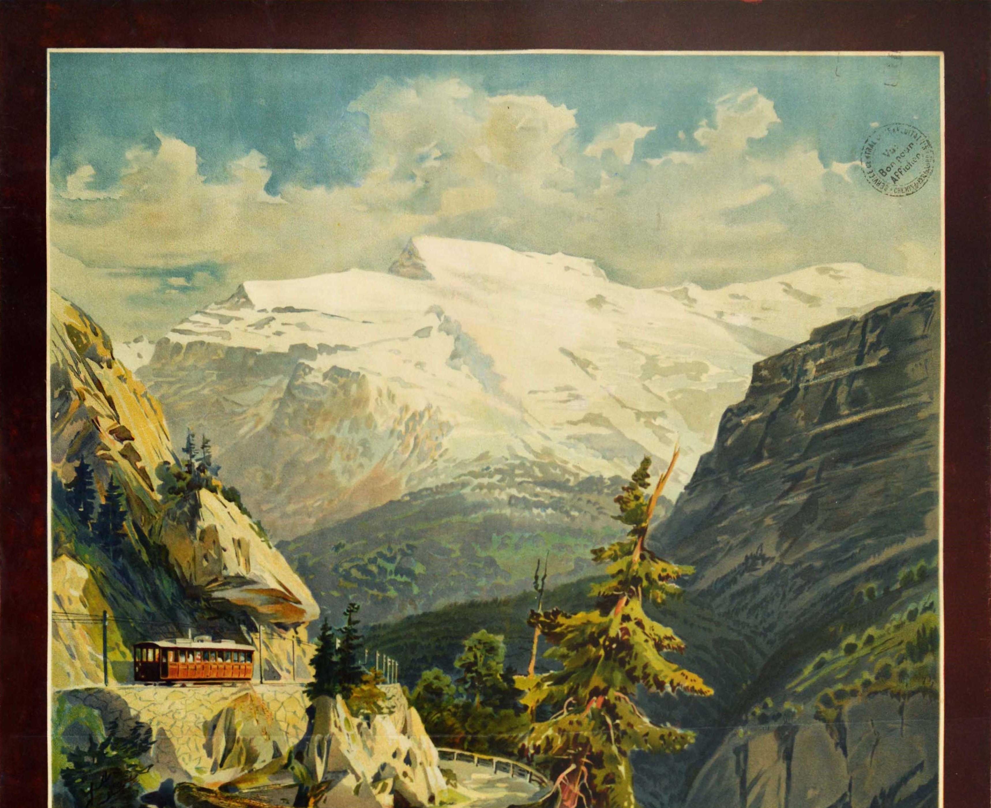 Original antique travel poster promoting the Stansstad Engelberg Bahn railway in Switzerland featuring a scenic painting by the Austrian artist and cartographer Anton Reckziegel (1865-1936) of a rocky mountain valley with a waterfall running through