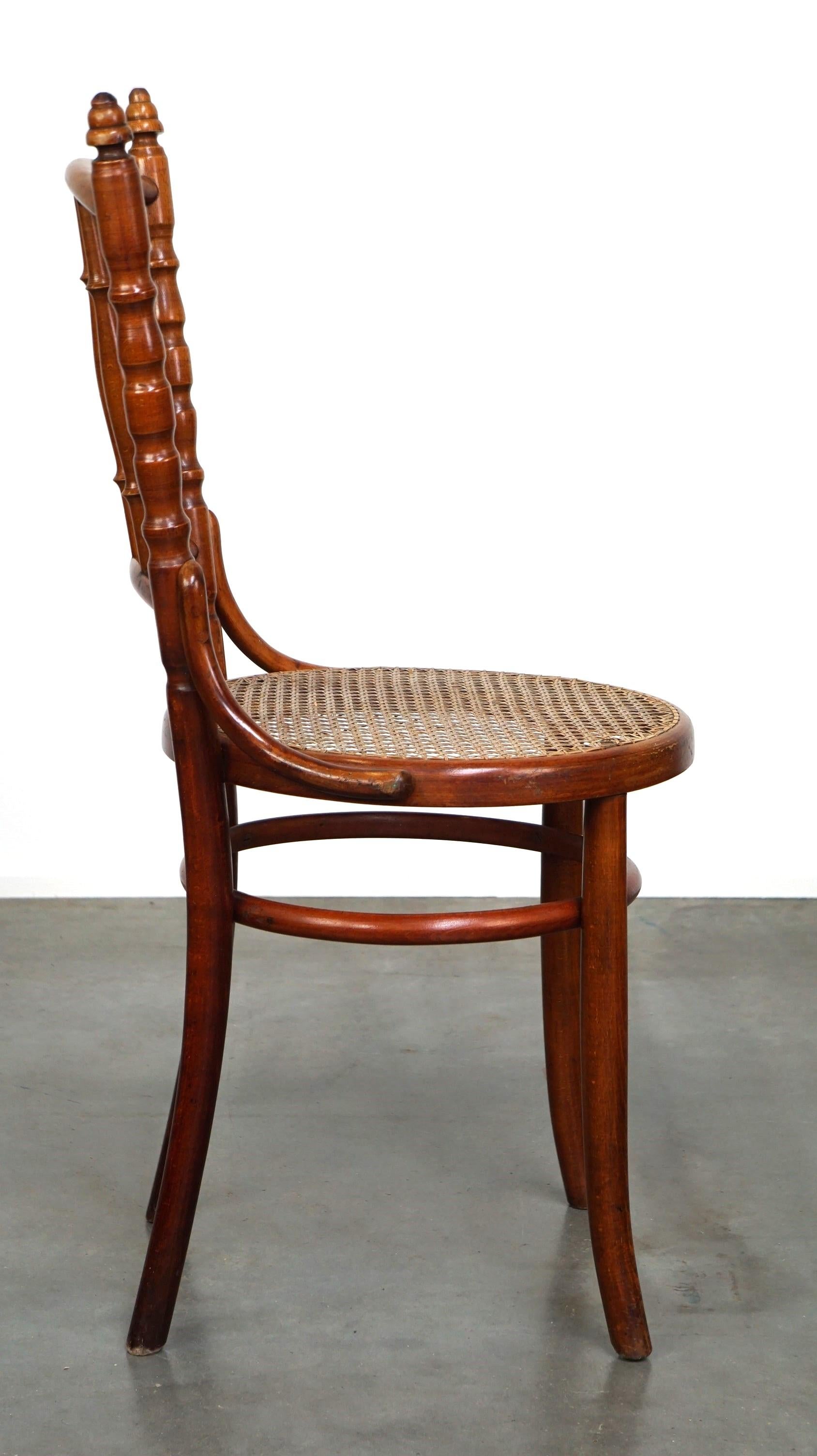 Austrian Original antique Thonet chair with great colors and a wicker seat For Sale