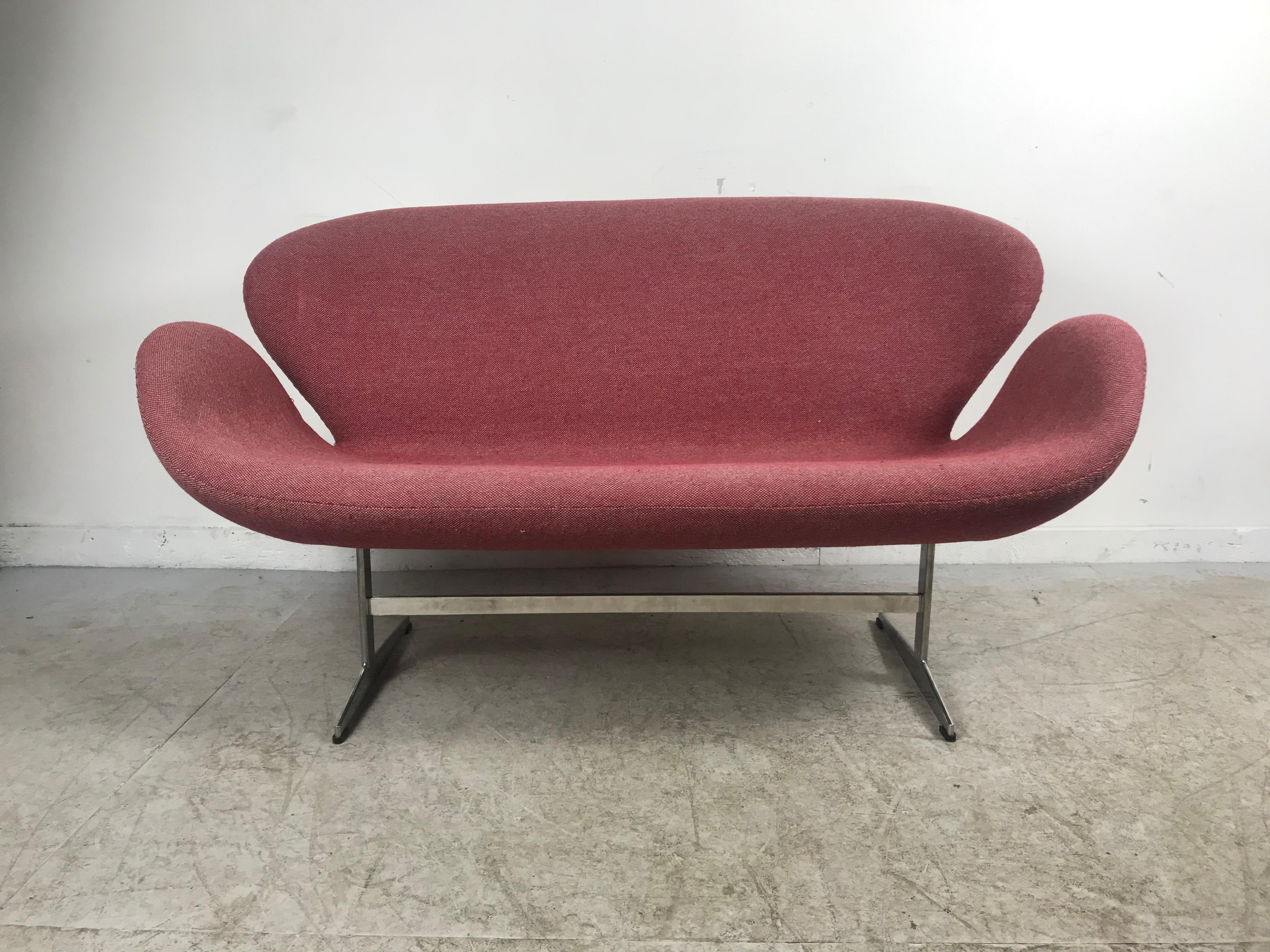 Originally created for the SAS Hotel in Copenhagen, this is Arne Jacoben's sofa version of the famous Swan chair. Designed as a companion piece to the swan and egg chair. It's an elegant form that is light in scale as well as a comfortable seat.
