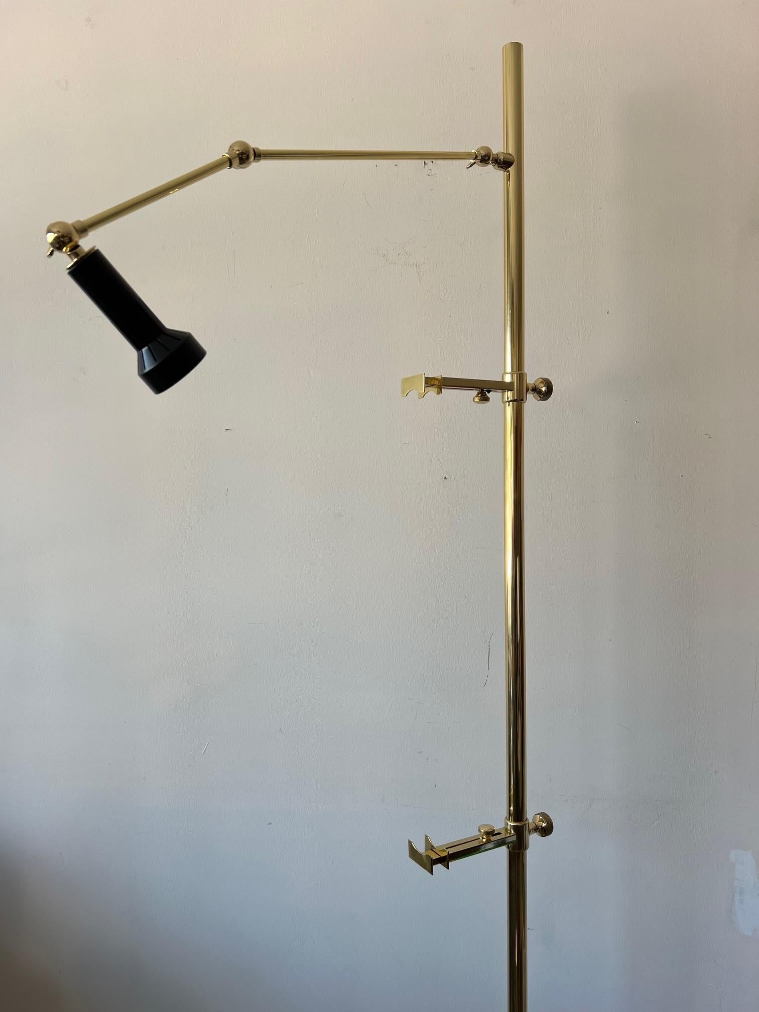 A rare and original, signed Arredoluce Monza easel lamp, ca' 1950's. Polished and lacquered brass, completely restored. 