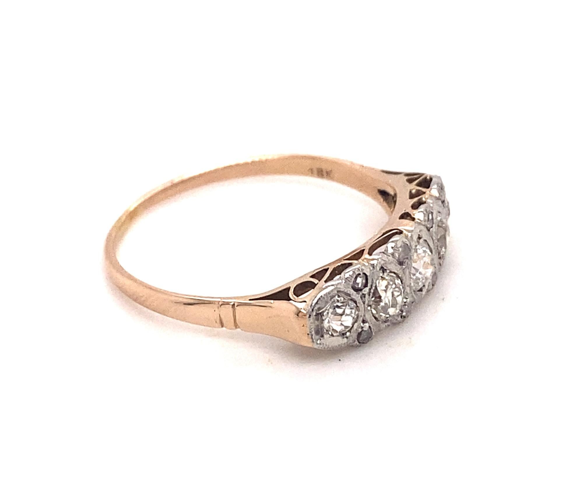 Original Art Deco 13 Diamonds Platinum 18K Yellow Gold Ring. This is a beautiful original art deco ring set with 5 old mine cuts and 8 rose cuts in platinum with a marked 18k yellow gold ring shank c.1930. The five diamonds are white sparkly old