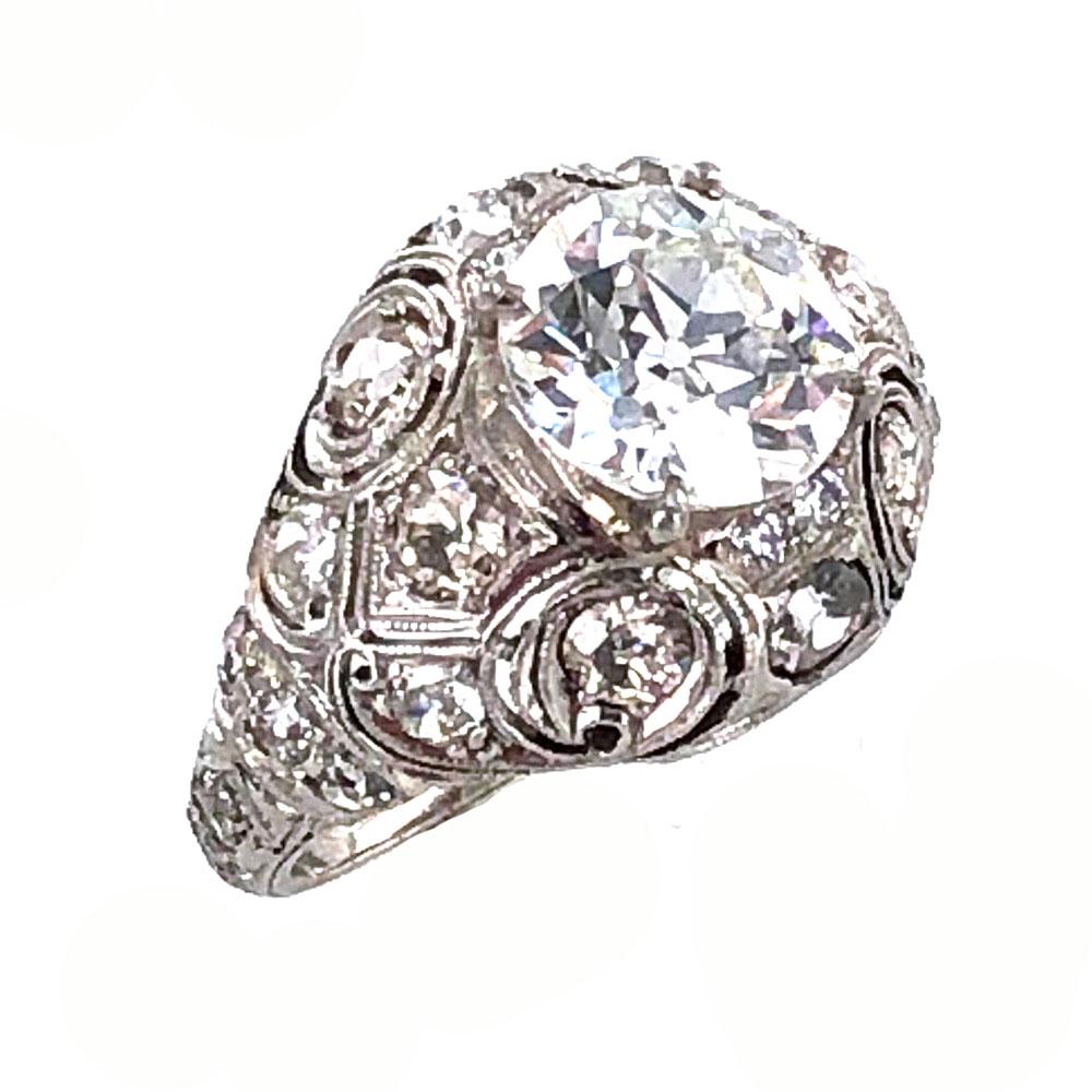 This beautiful Art Deco engagement ring features a 2.29 carat old european cut diamond graded J color and VVS2 clarity. The diamond is GIA certified. Surrounding the center diamond are approximately 1.50 carat total weight of old cut diamonds all