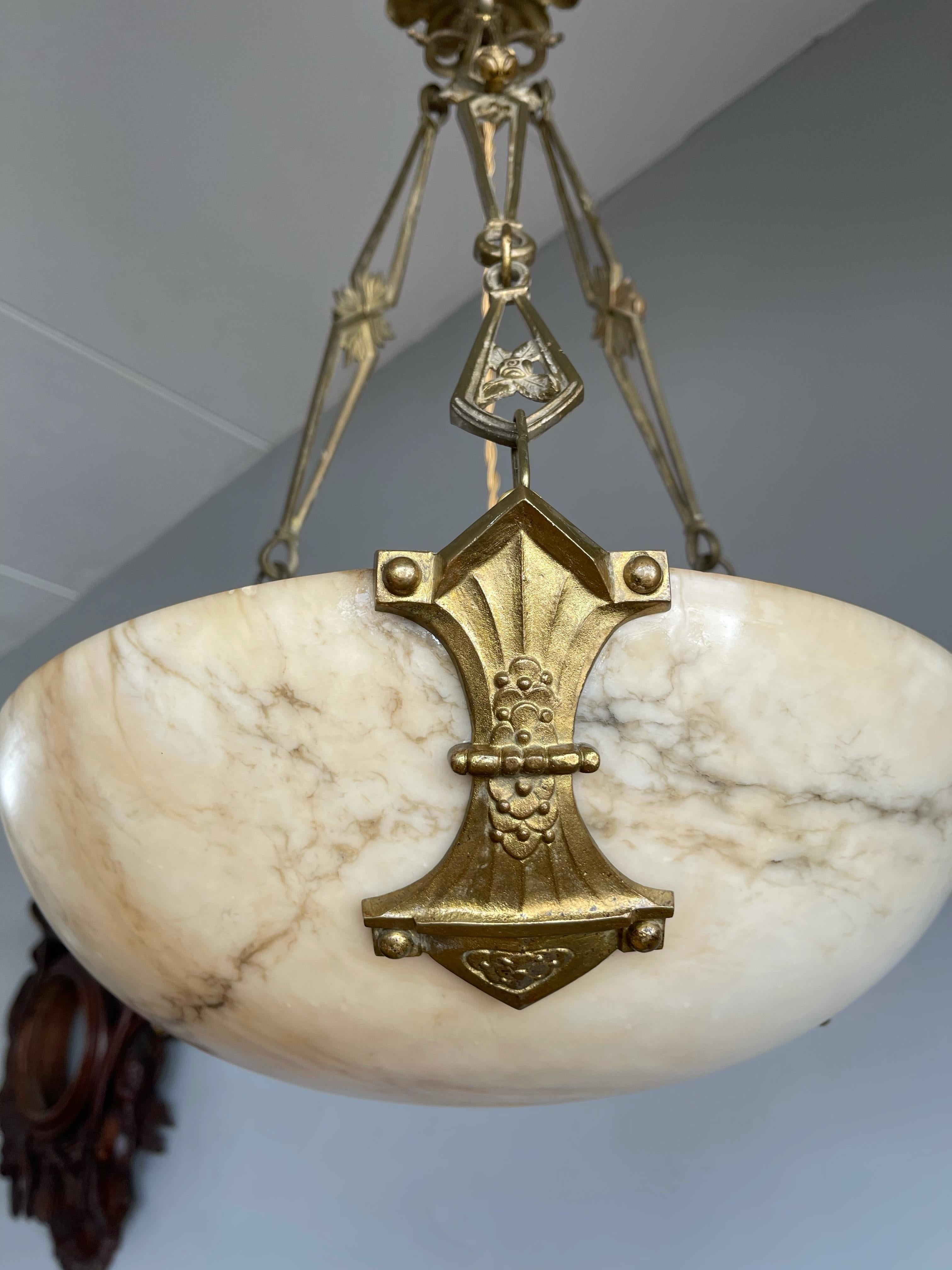 Another beautifully designed, all handcrafted and excellent condition, antique mineral stone fixture.

If you are looking for a good condition and good size Art Deco light fixture then this fine specimen with its unique pattern of veins could be