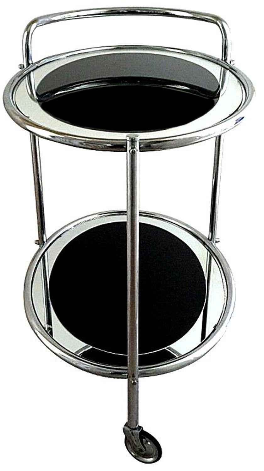 Now this really is a fabulous hostess bar cart. Original 1930s Art Deco chrome two-tier trolley. A tubular chromed frame makes up the skeletal body of the cart with thick oval glass inserts which are jet black with mirrored edging, very glamorous!