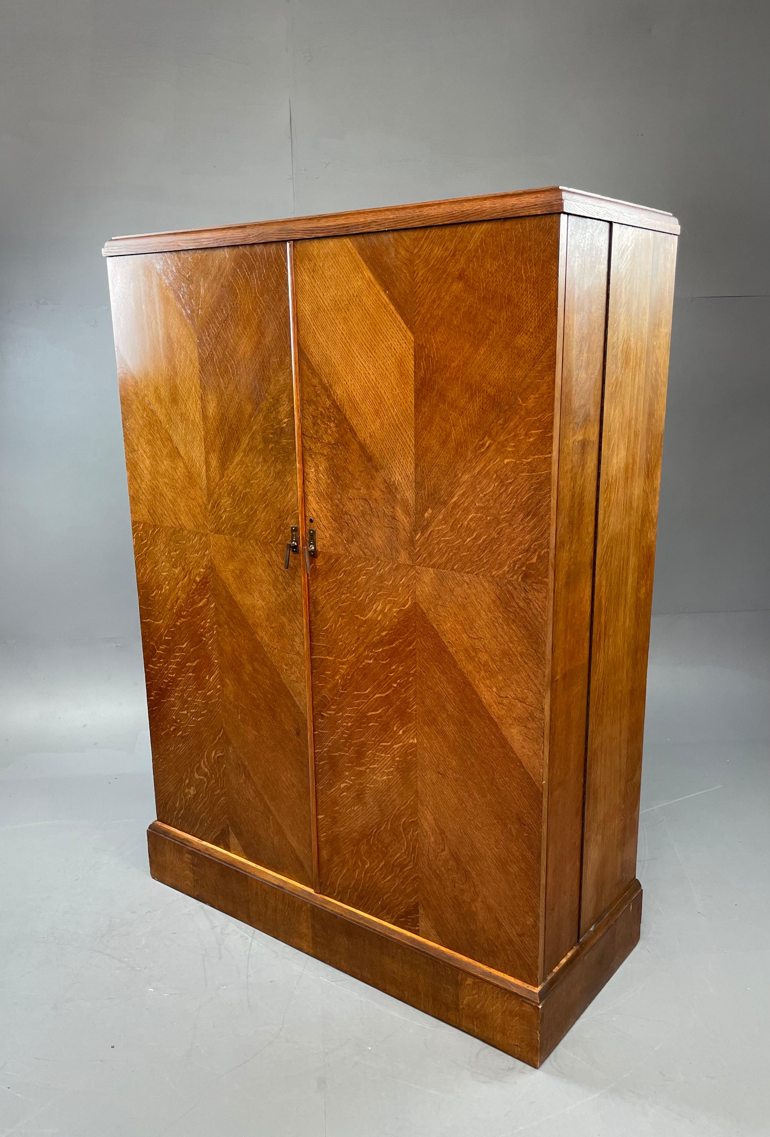 Original oak compactom deep door gentleman’s fitted wardrobe 
This iconic British made and designed wardrobe is in fantastic original condition 
The interior is fully fitted and retains all original labels and fittings 
The right hand door opens