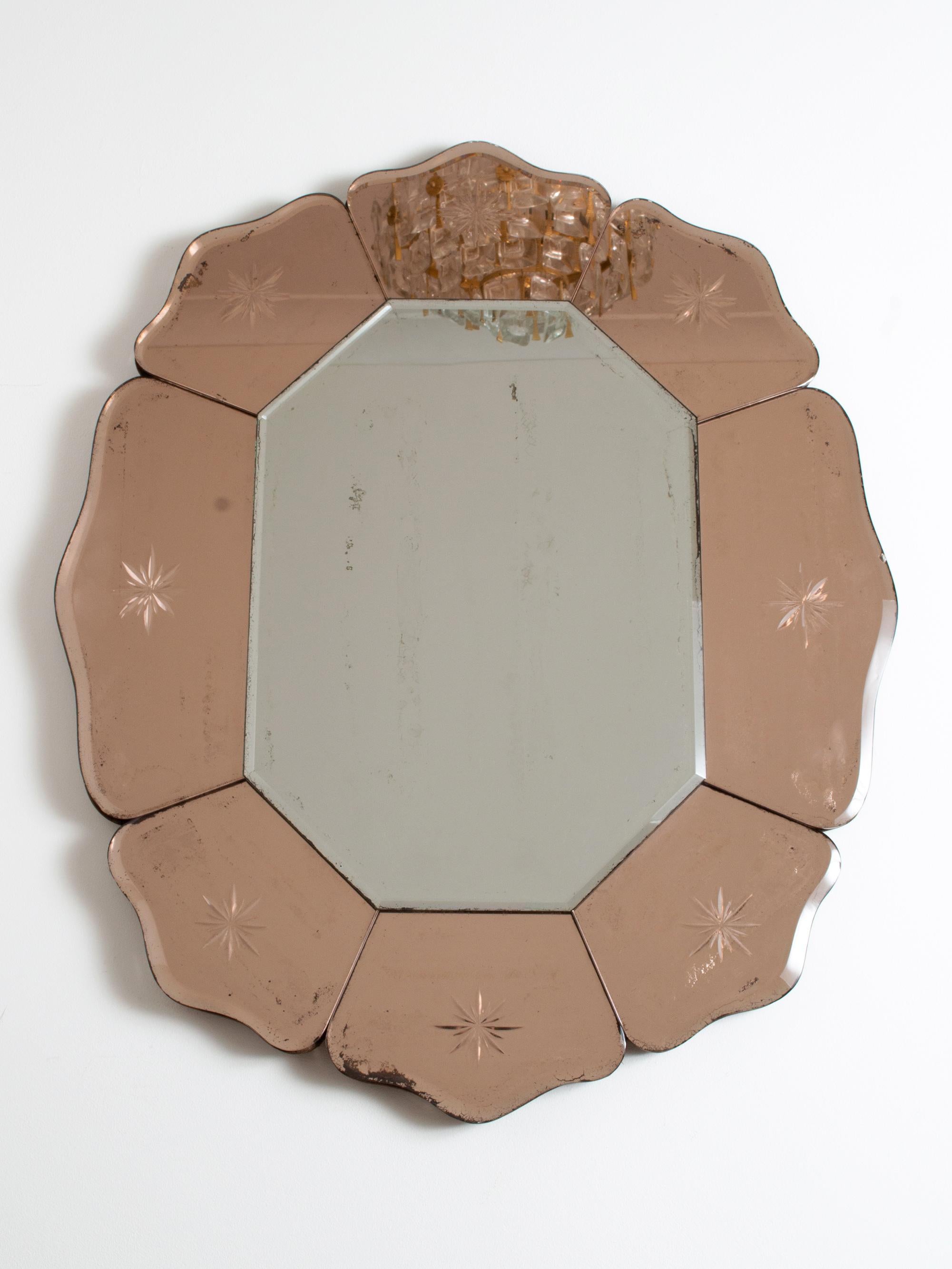 Original Art Deco flower shaped mirror rose glass tinted plates. France, circa 1930.
Beautiful natural foxing / loss of silvering to the glass plates, offering an attractive patination.