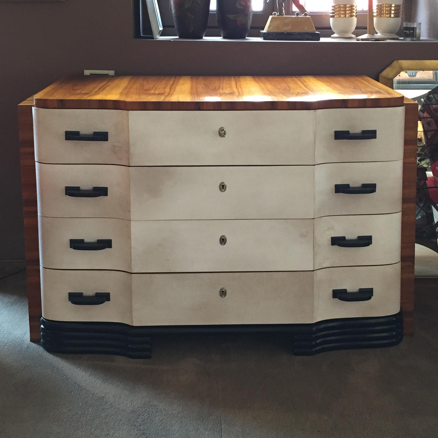 Stunning French chest of drawers in walnut and parchment, 1930s.