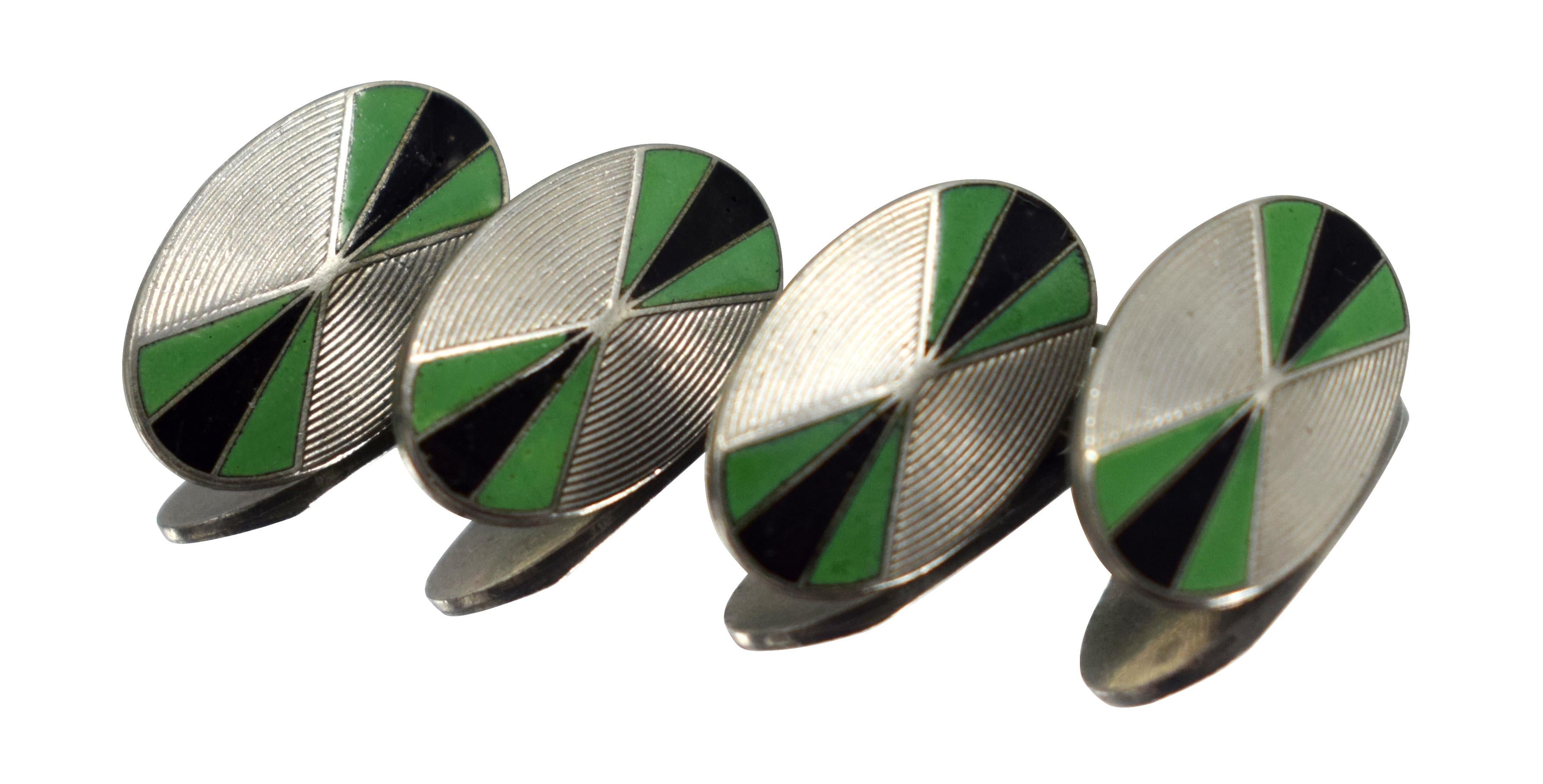 For gentleman out there who lean towards something a little different and less generic and oozing style consider these original matching pair of Art Deco men’s Oval shaped cufflinks with green and black enamel decoration on an engine turned chrome