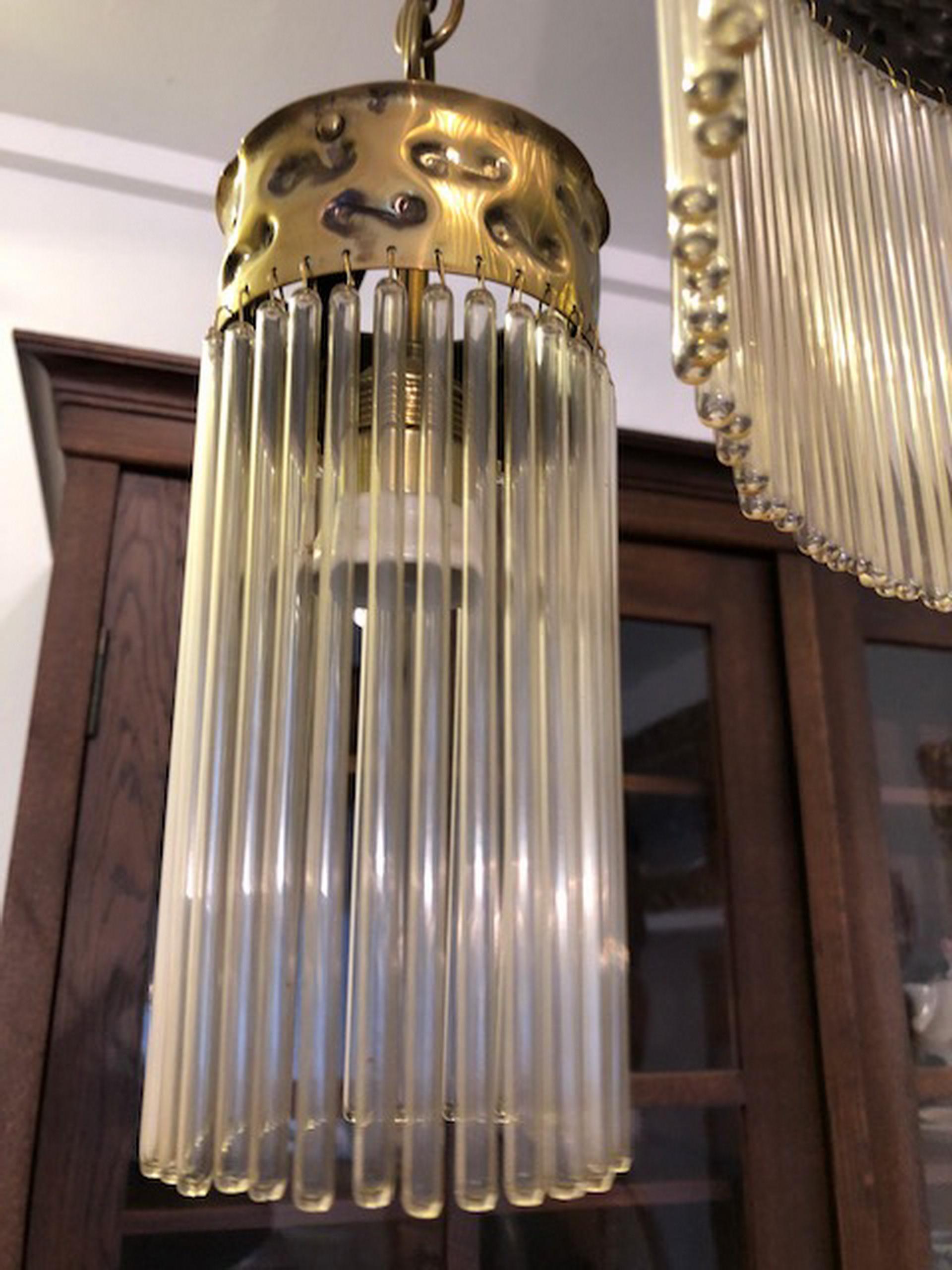 Original Art Deco or Jugendstil hanging lamp chandelier.
A charming, lightly used, very well-preserved and very pretty four-flame chandelier from around 1915.
Was manufactured in Germany and is made of a combination of gold-colored metal, brass