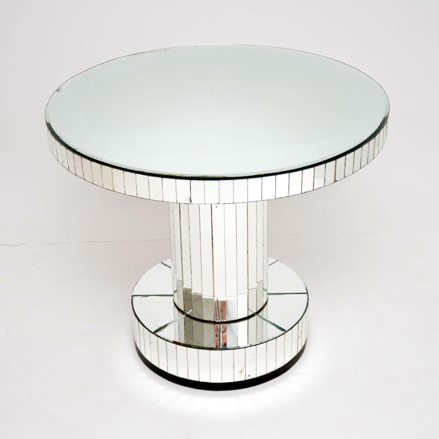 A superb and very rare original Art Deco period mirrored occasional table. This was made in England, it dates from the 1930’s.

This is a glass table that has been in use for nearly 100 years, so it is not perfect but is in very good condition for