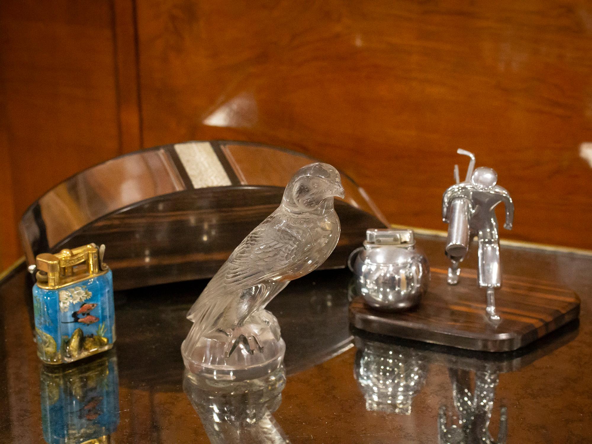 Original Rene Lalique Car Mascot #1124 Bouchon de Radiateur Faucon

From our Rene Lalique collection, we are delighted to offer this stunning French Rene Lalique Falcon (Faucon) car mascot. The car mascot modelled as a Falcon perched upon a rock