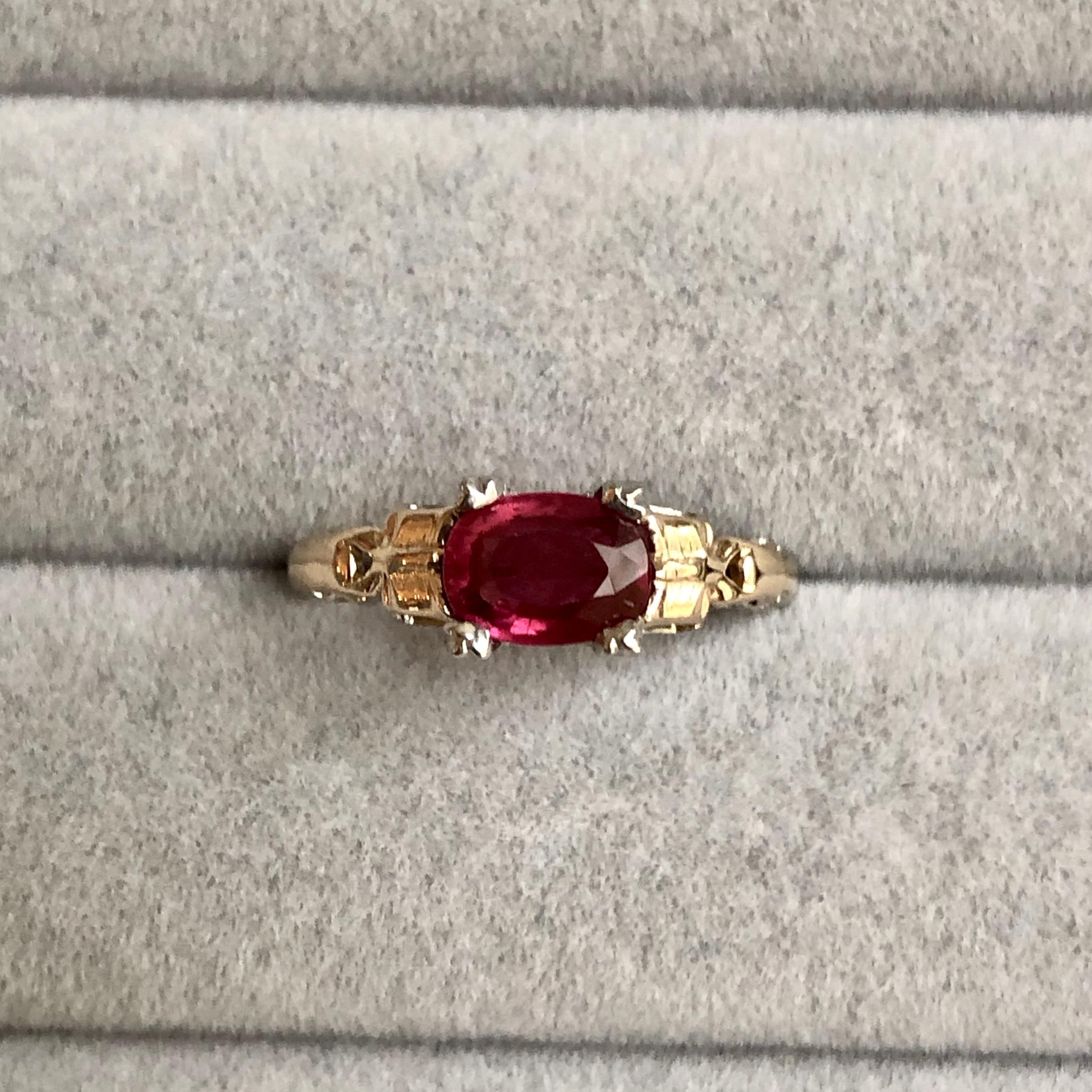 Original Art Deco Ruby Platinum 18k Yellow Gold Ring. This is a beautiful original art deco ring c.1930. The ring is set with 1 oval cut ruby in platinum with 18k yellow gold. The gorgeous ruby is estimate to be 1.05 carats. The ruby is a natural